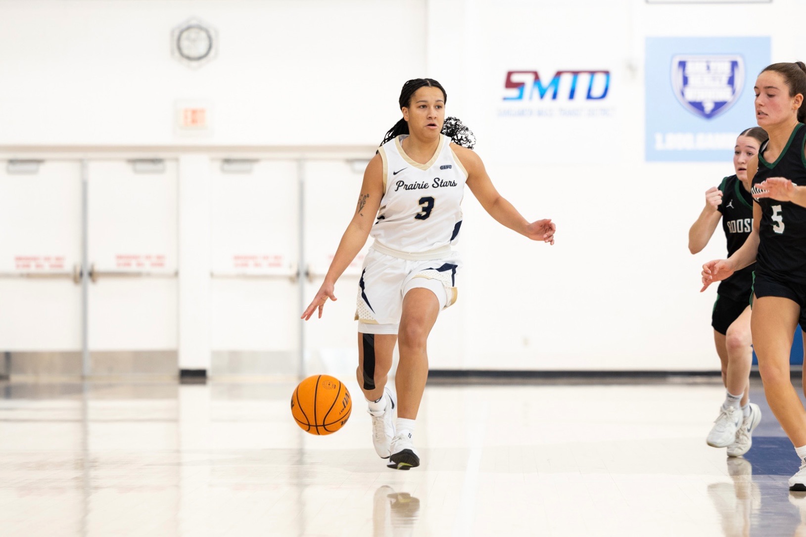 Kayla Rice playing basketball at UIS