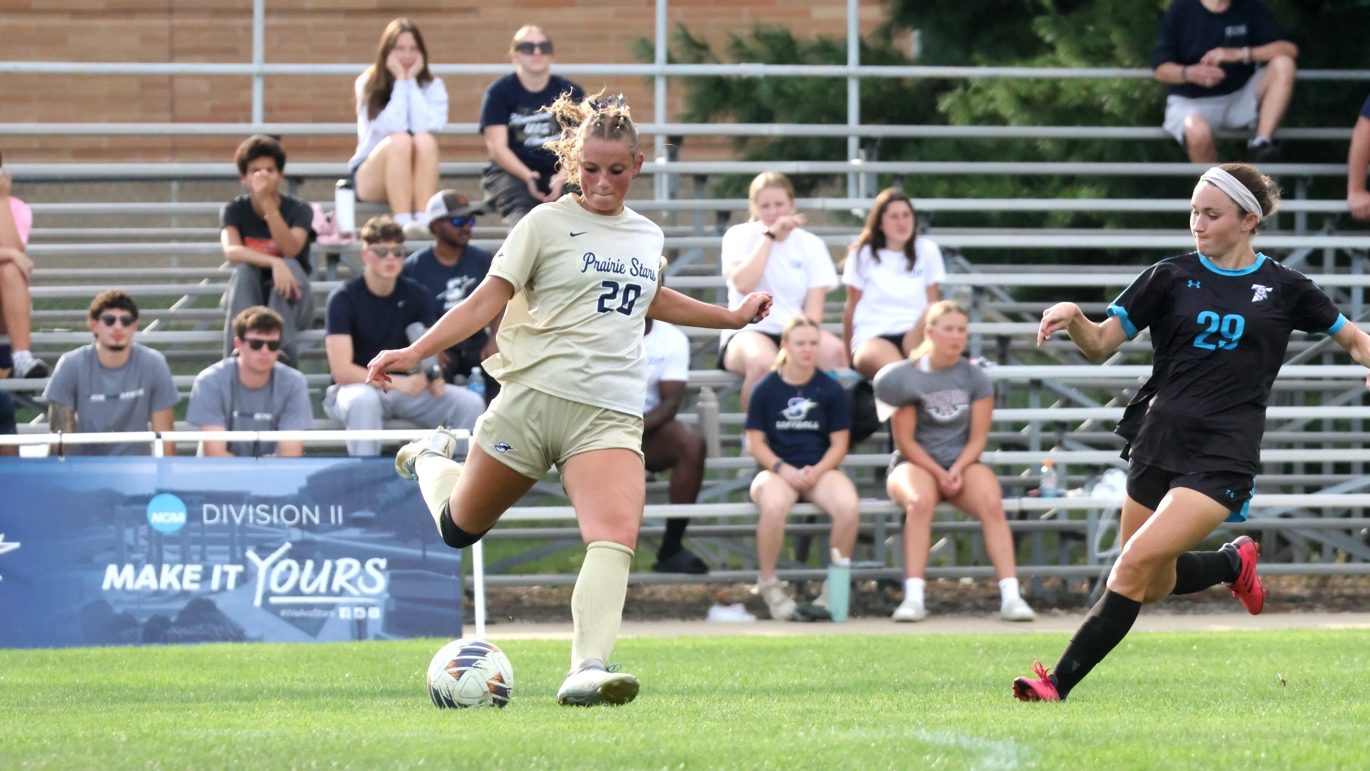 Jules Sather playing soccer in UIS gold