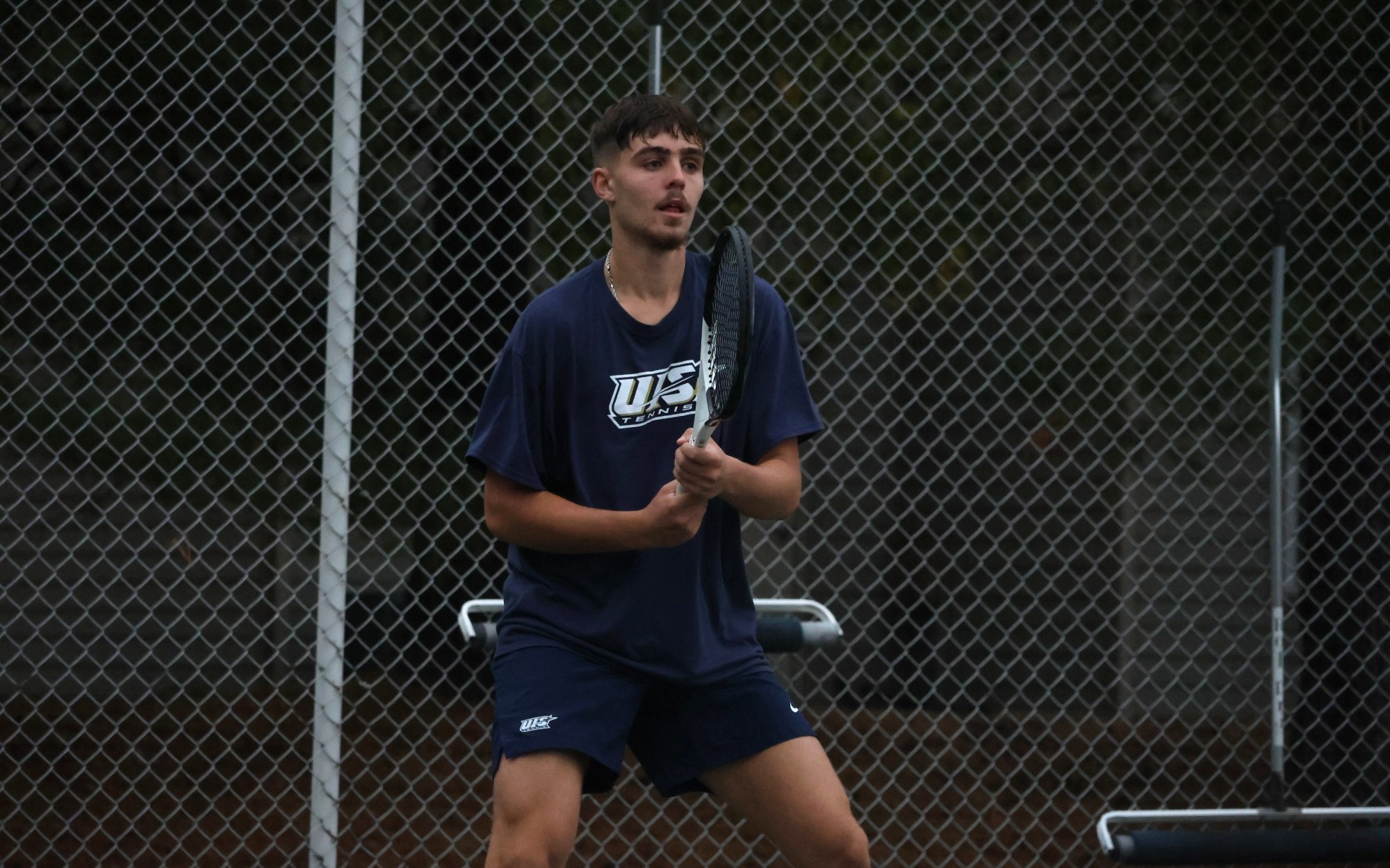 Miran Todorovic playing tennis at UIS