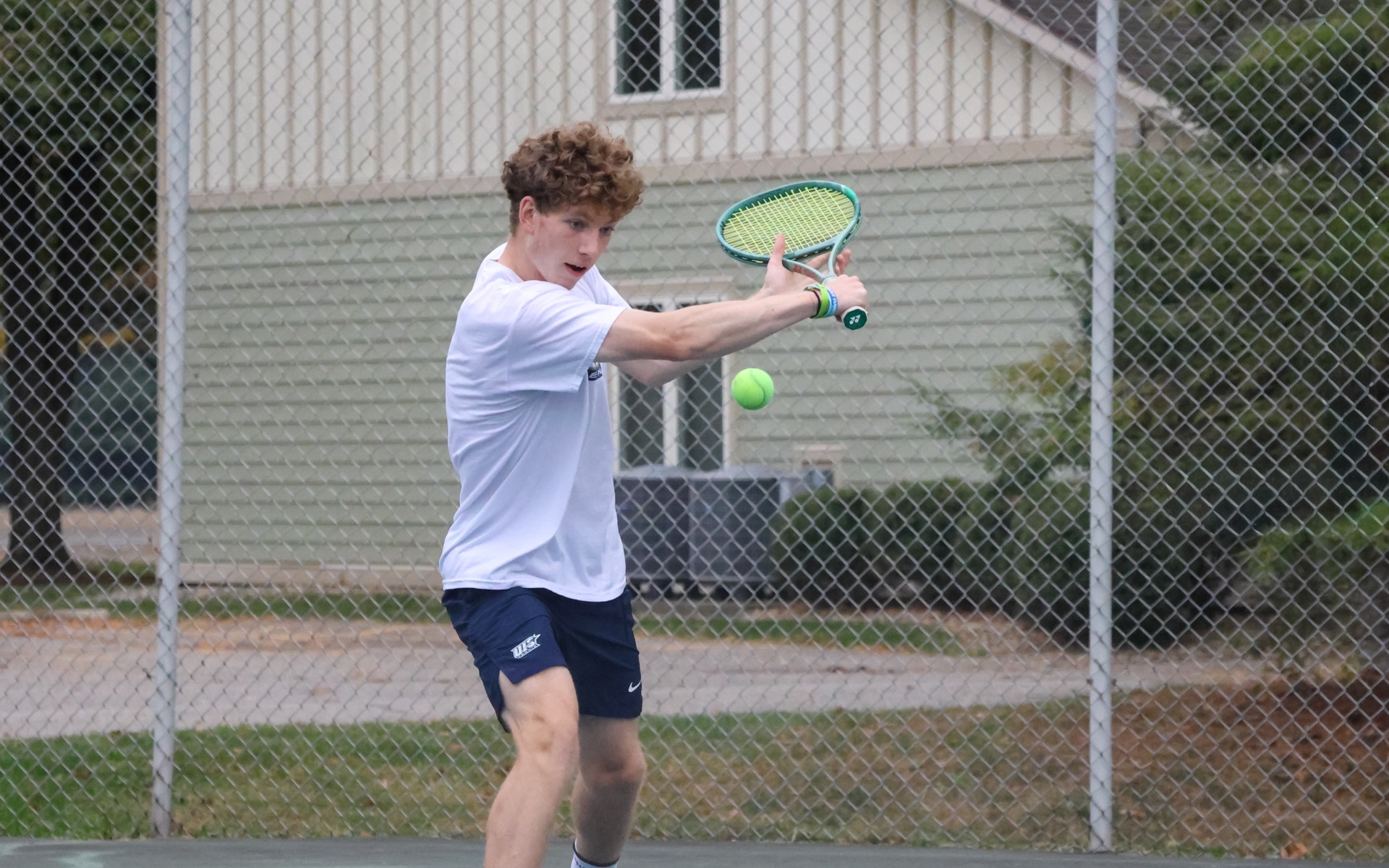 Kai Van-Roon playing tennis
