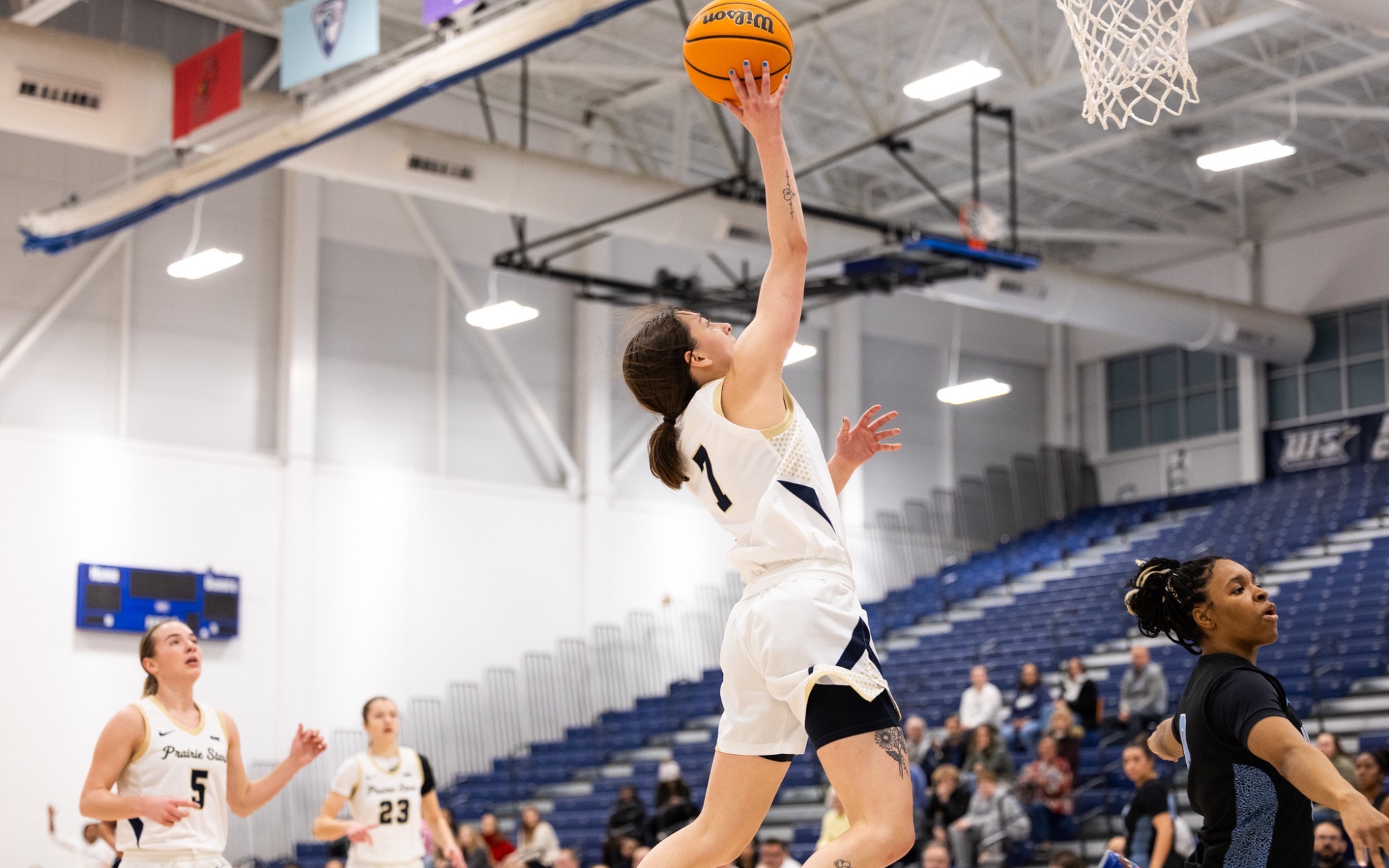 Kennedy Osterman playing basketball at UIS