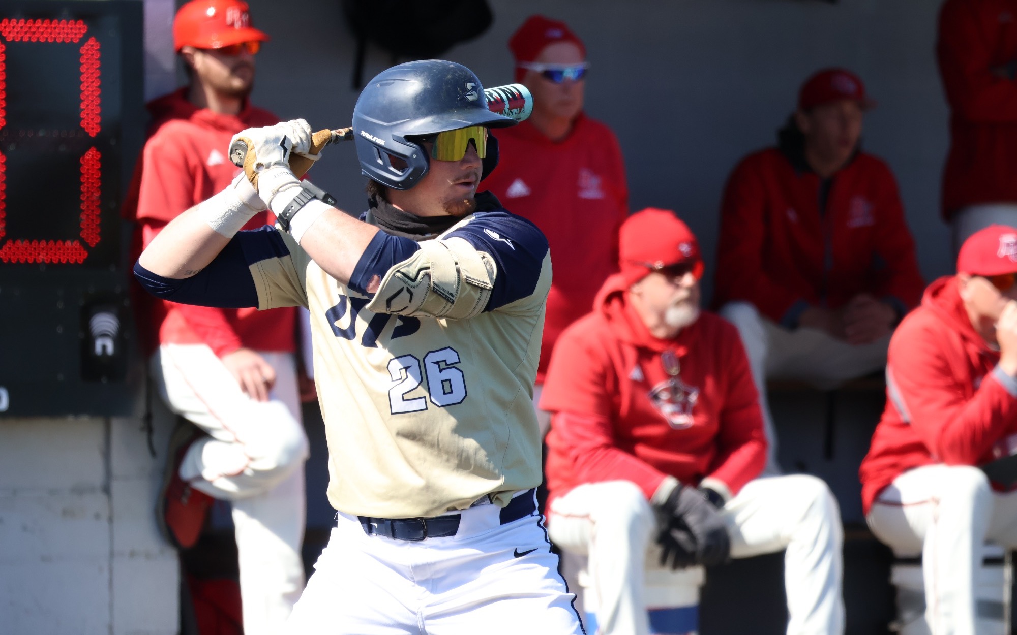 Johnny Wendling batting in gold UIS uniform