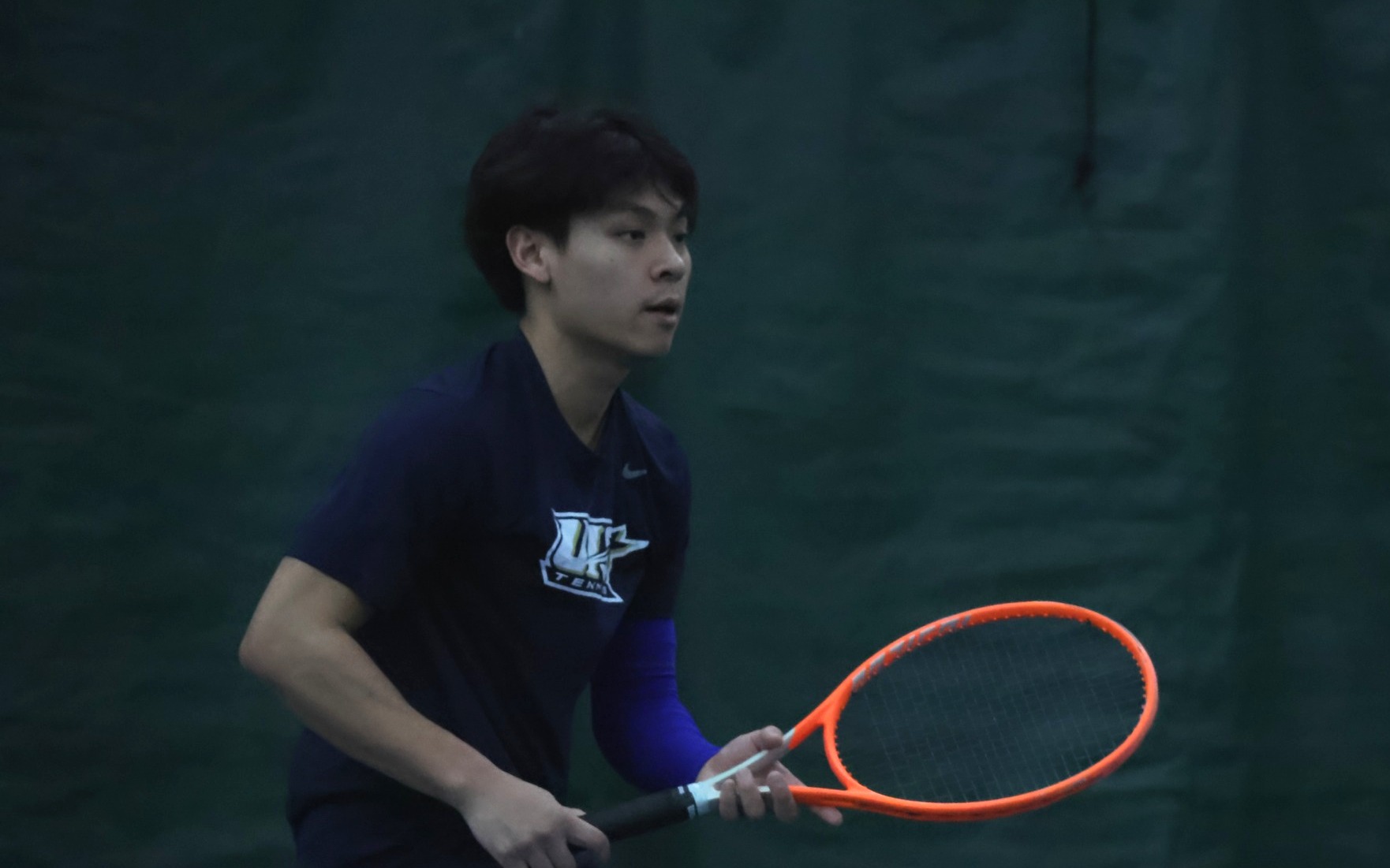 Lin En Tan playing tennis