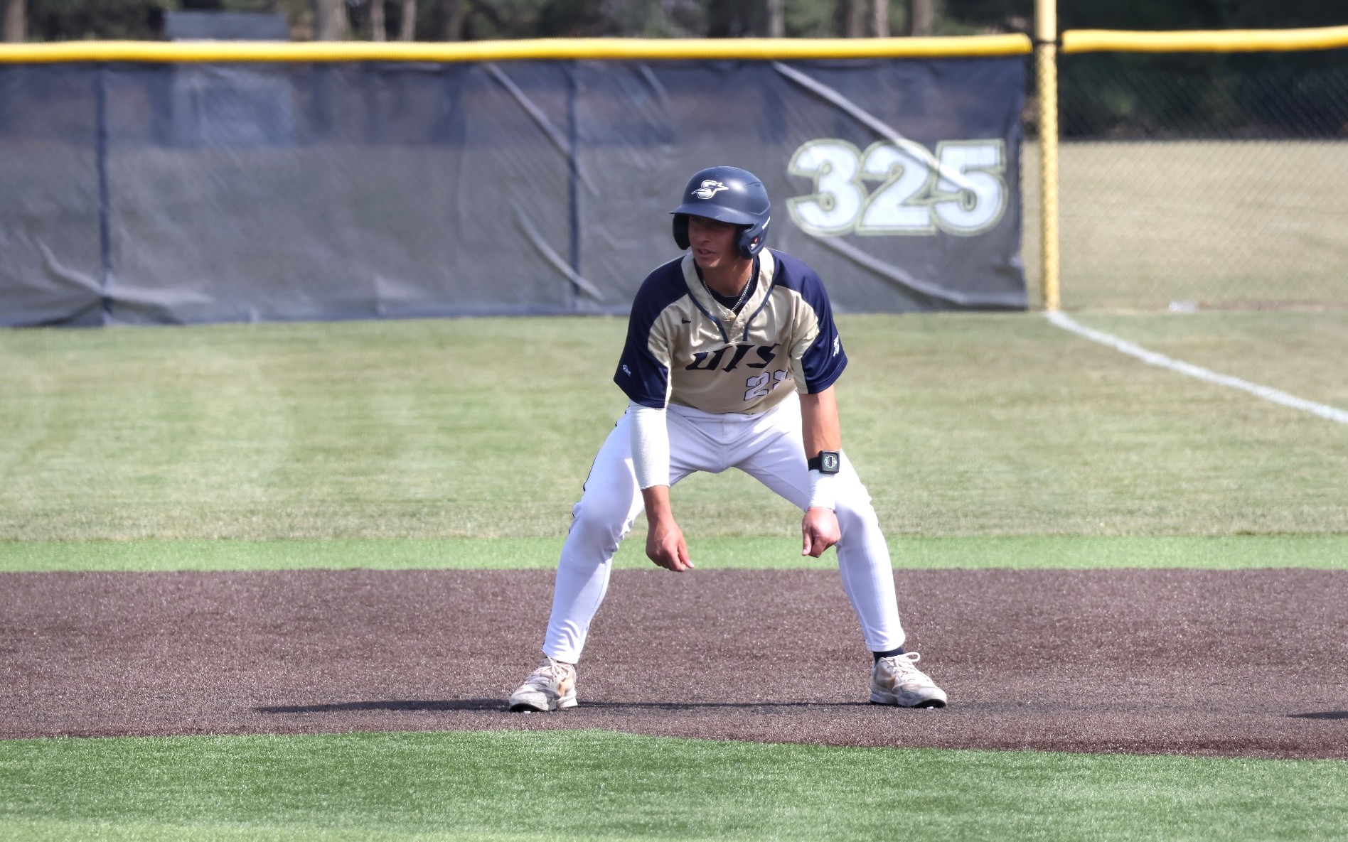 Chris Suchoski base running in golf UIS baseball uniform