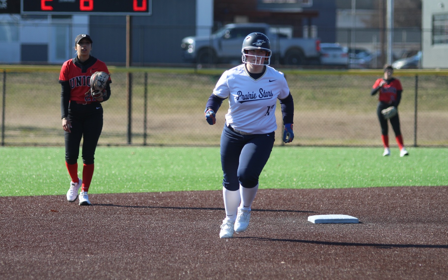 Emme Steward running the bases after hitting a home run