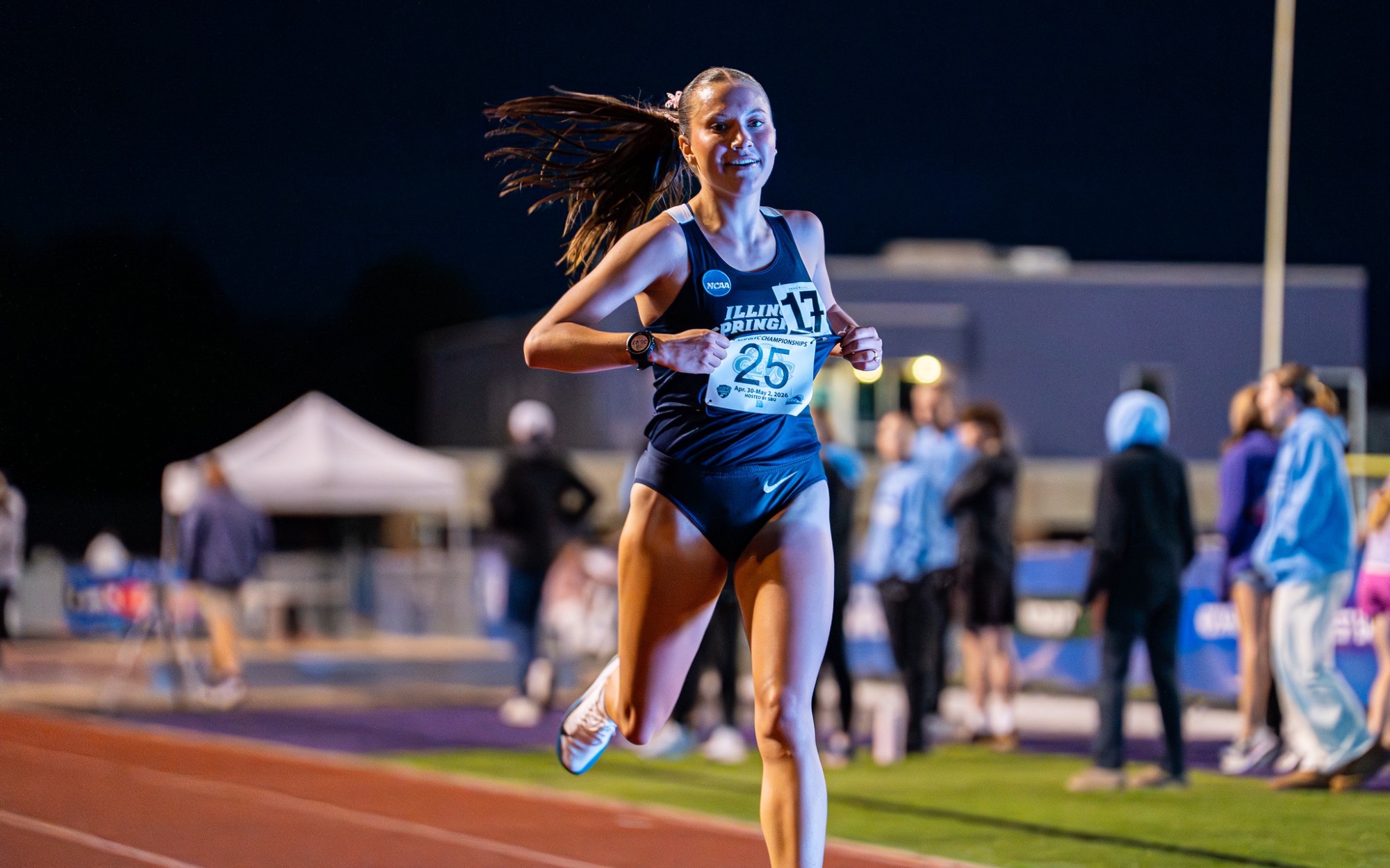 Madelyn Miller-Ross crosses finish line at track meet