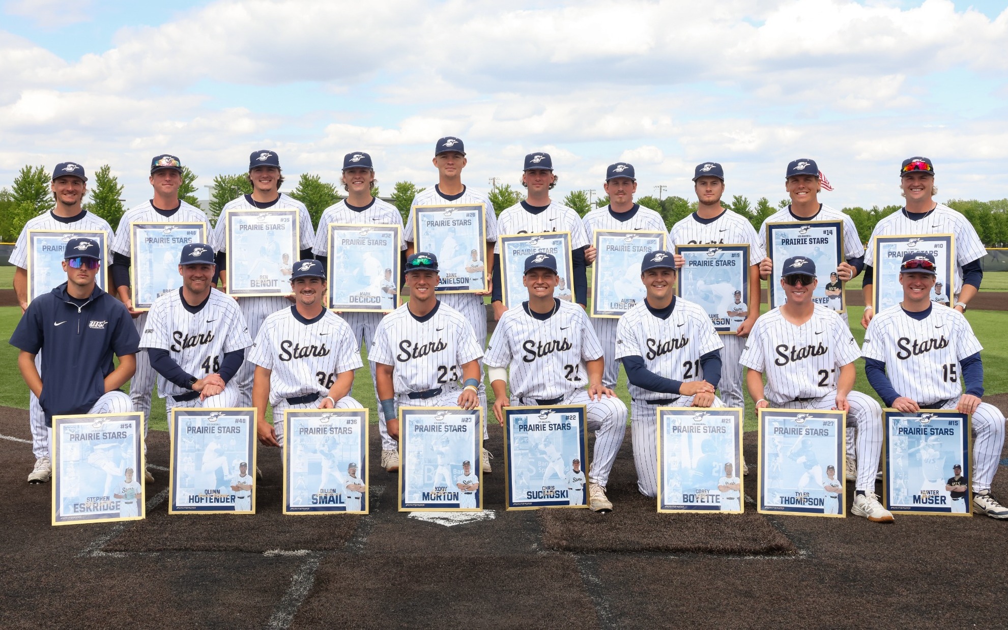 UIS baseball senior class pictured on field in uniform with their senior gifts