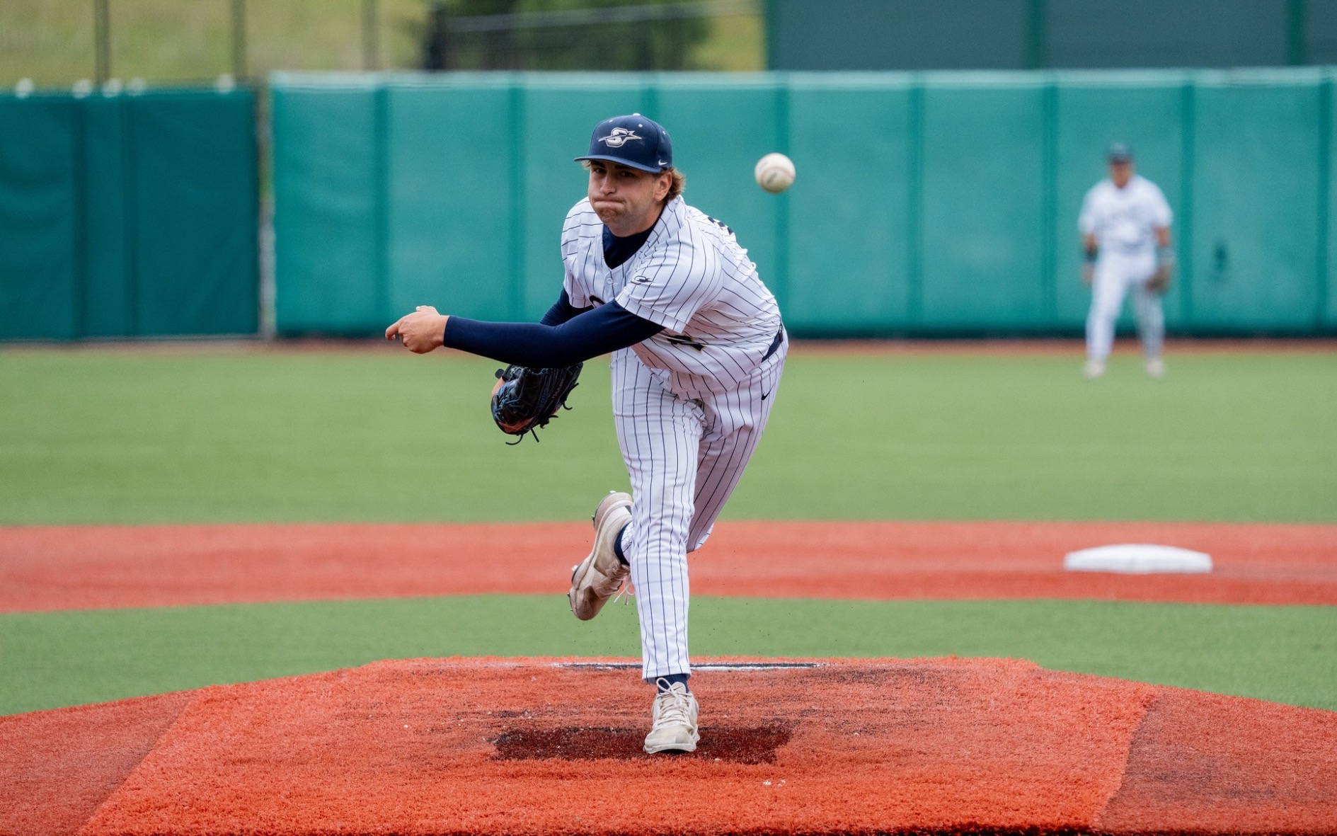 Graham Kasey pitching in GLVC baseball tournament