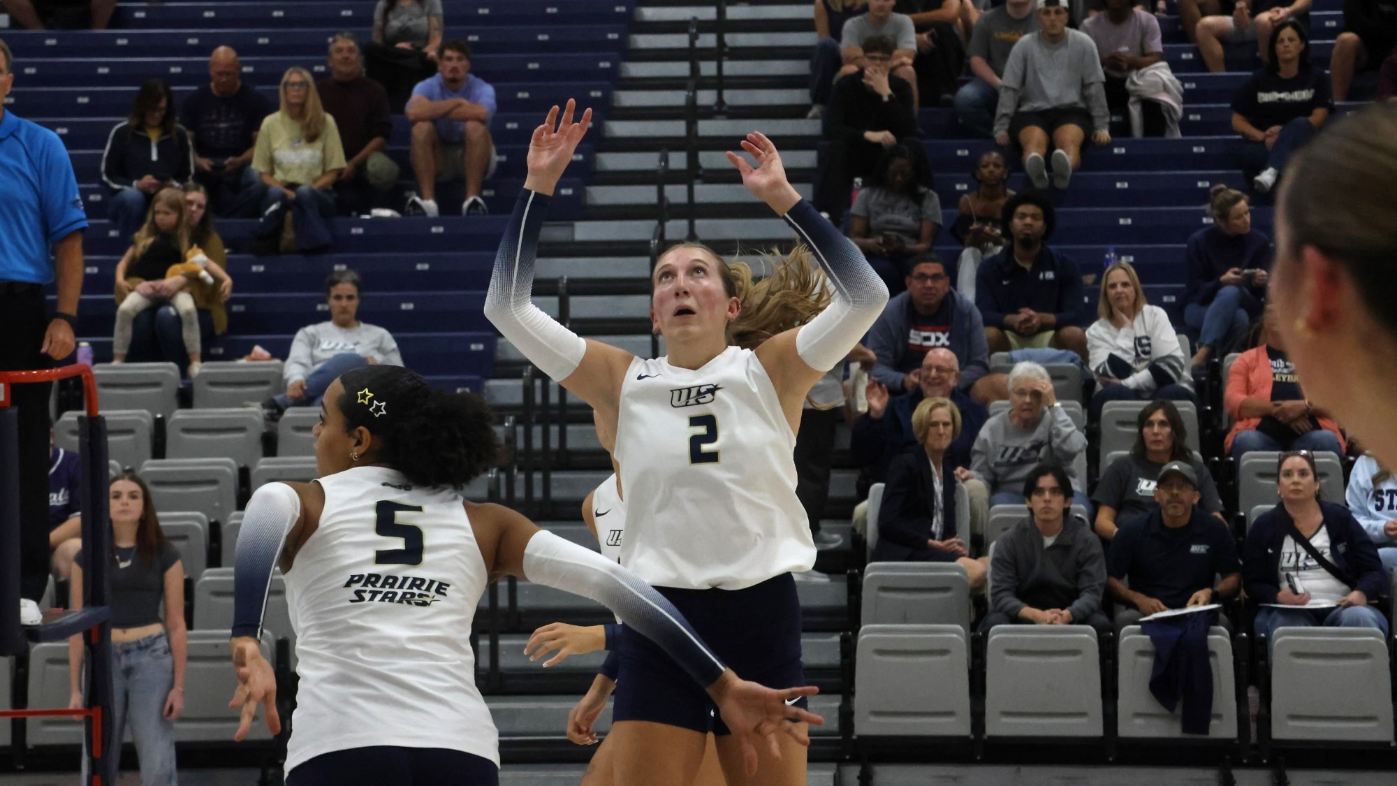 Madi Siefken setting for UIS volleyball