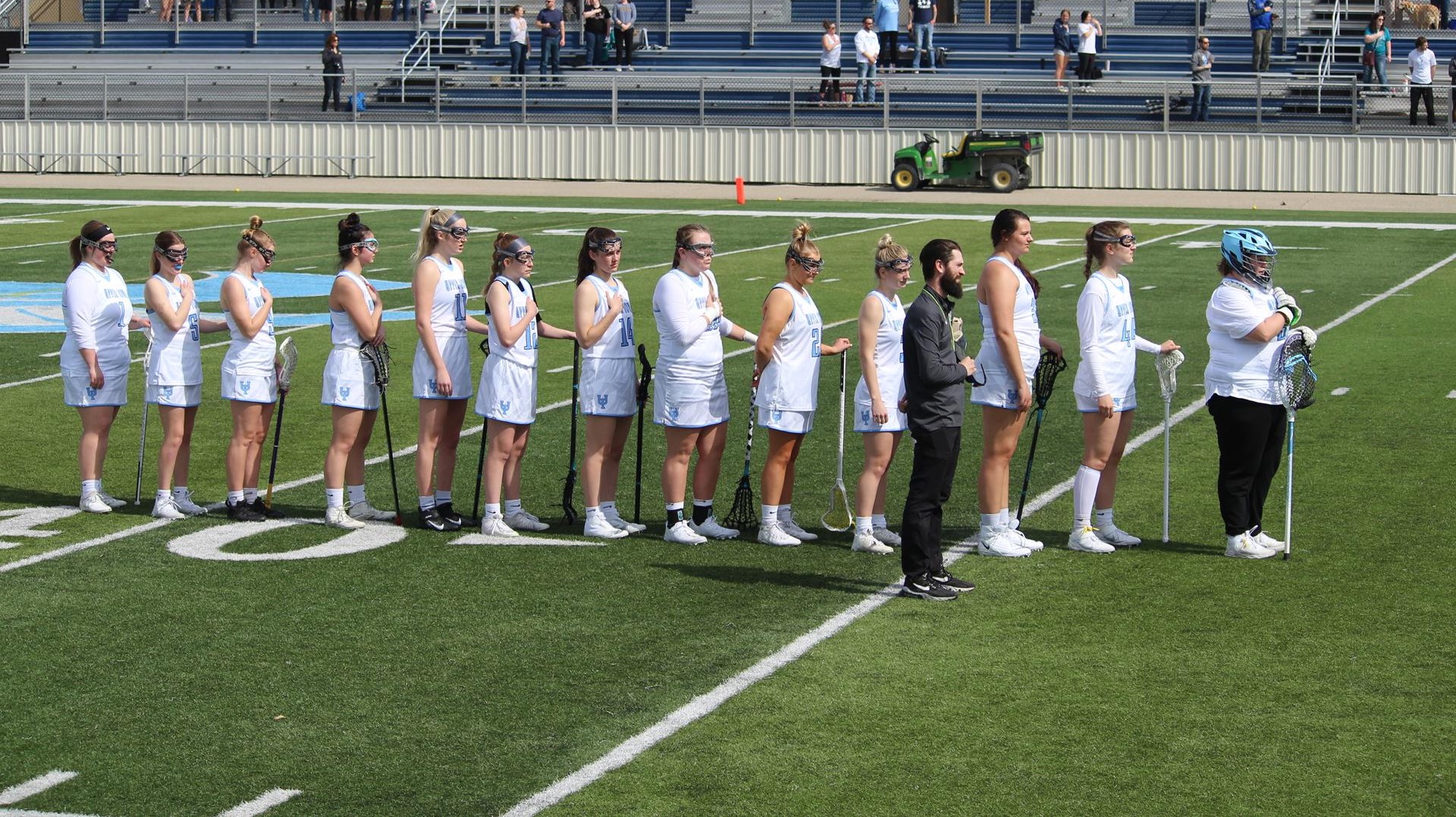 Team during the anthem prior to Northern Michigan game