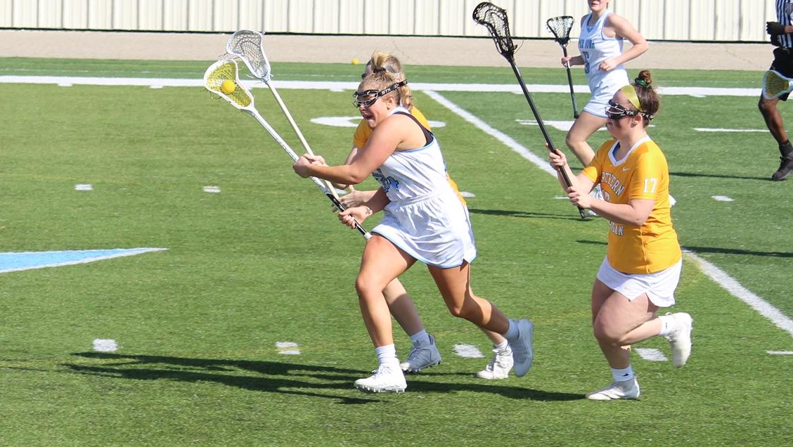 Maya Chesky attempting to clear the ball against Northern Michigan