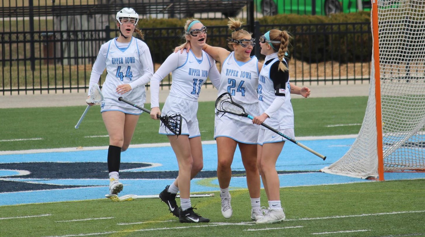 Celebration after Maya Chesky (24) scores the first goal of the game against Quincy