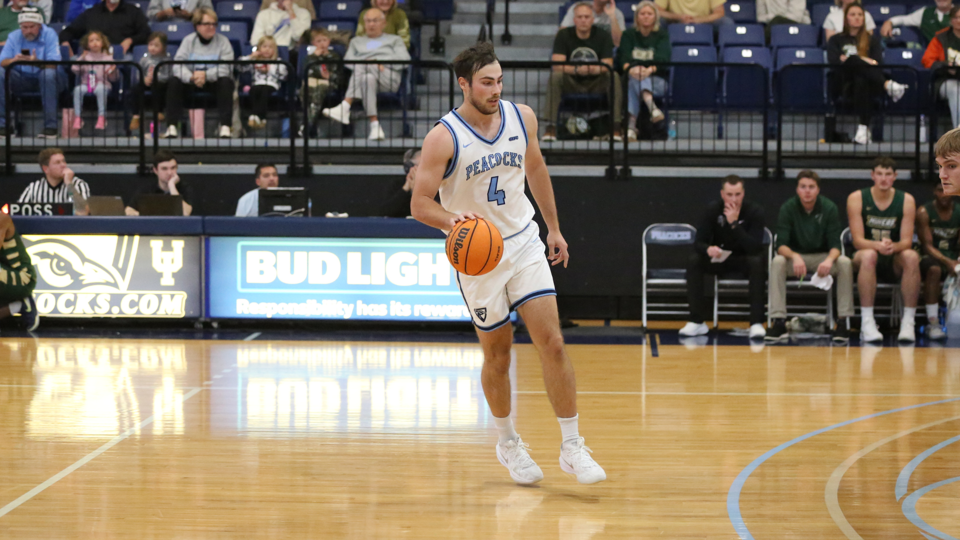 Hrncir aid Peacocks in upset victory