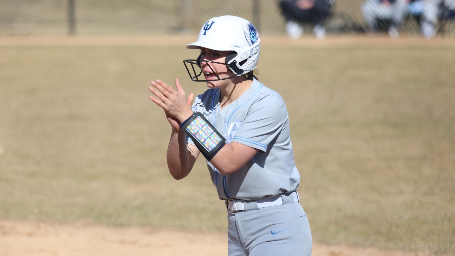 Dorothy Ziebell cheers on her team vs. Rockhurst