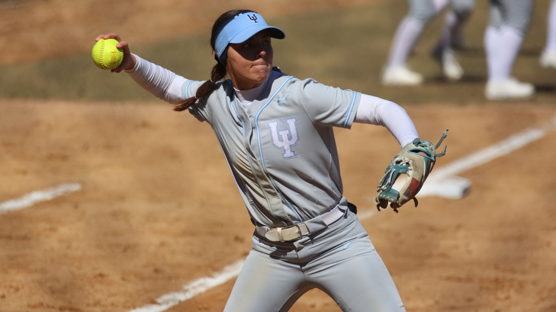Rae VanMilligan makes a throw to first