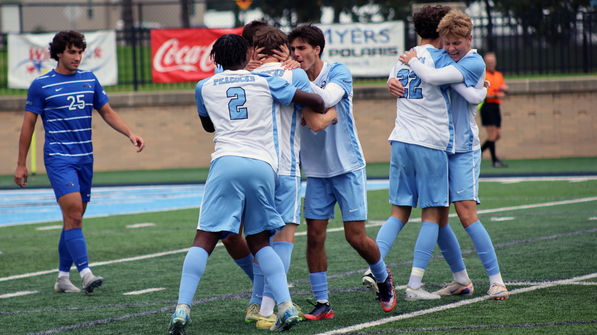 Upper Iowa men's soccer celebrating a goal vs. Rockhurst 2026