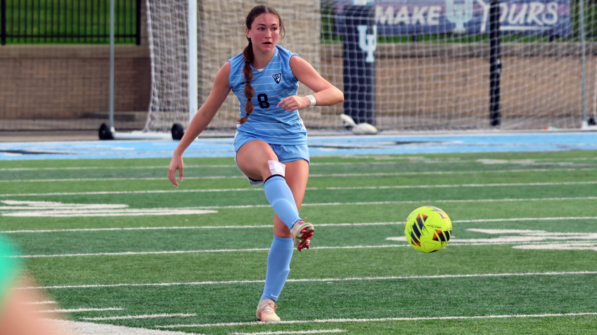 Rhea Buchanan kicking the ball vs. Lincoln 9/16/26