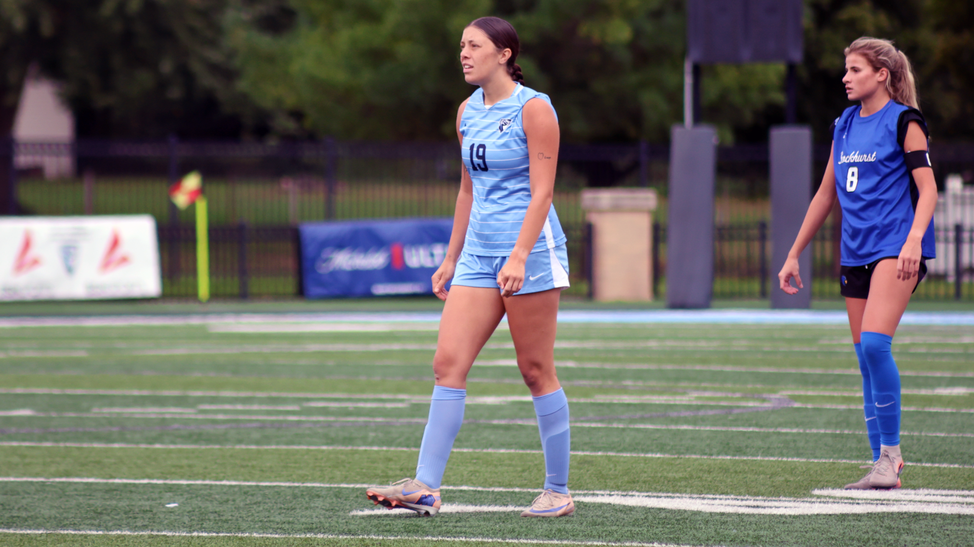 Catherine Wolf watching the play vs. Rockhurst 9/26/26