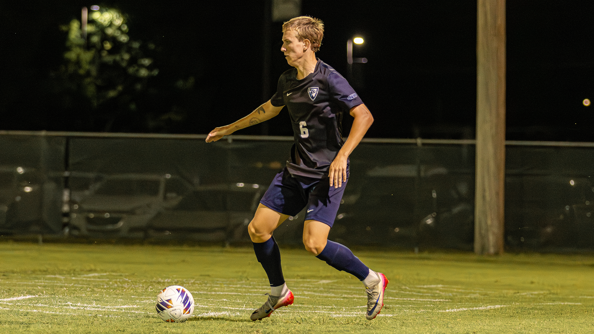Arnas Kurakinas dribbles soccer ball vs Missouri S&T