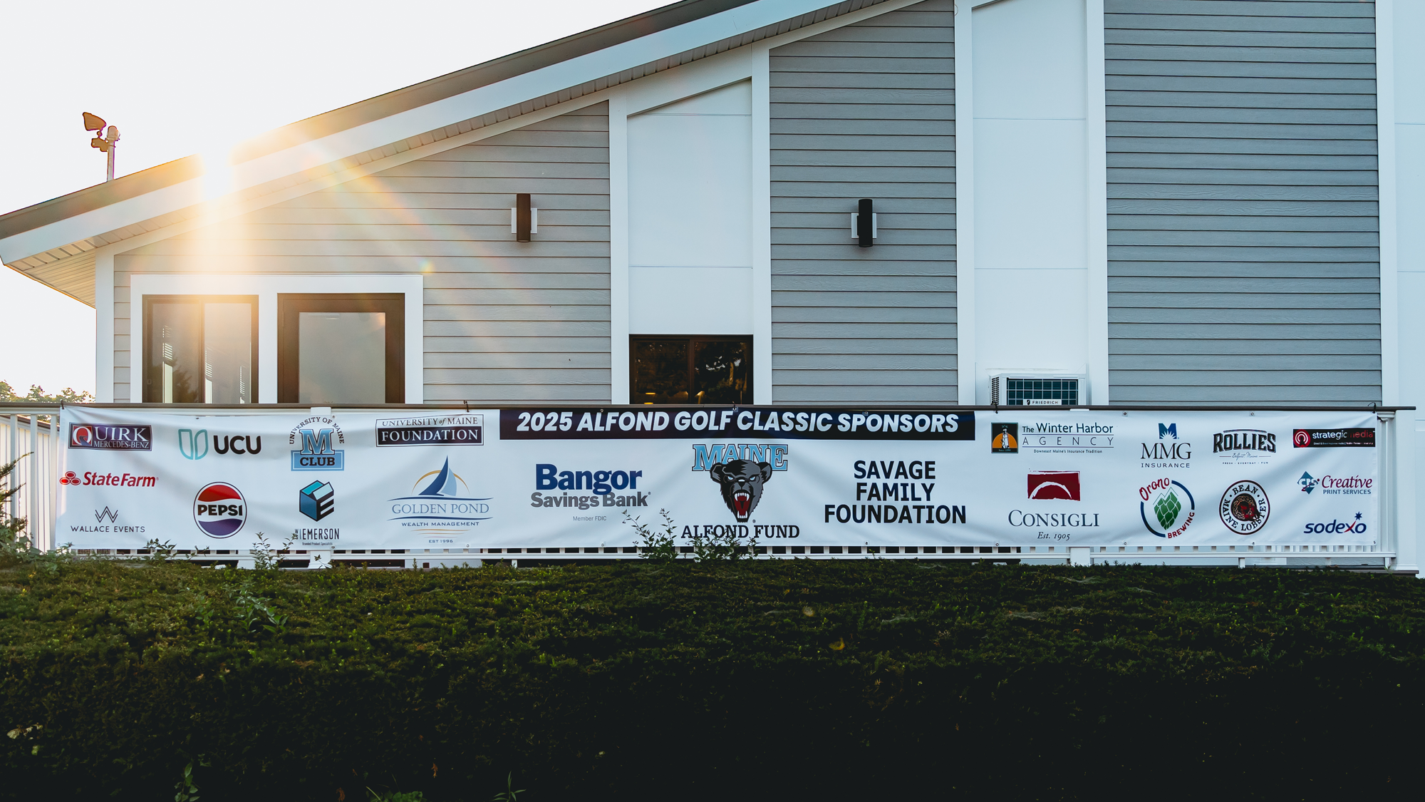 Shot of alfond classic sponsors banner.
