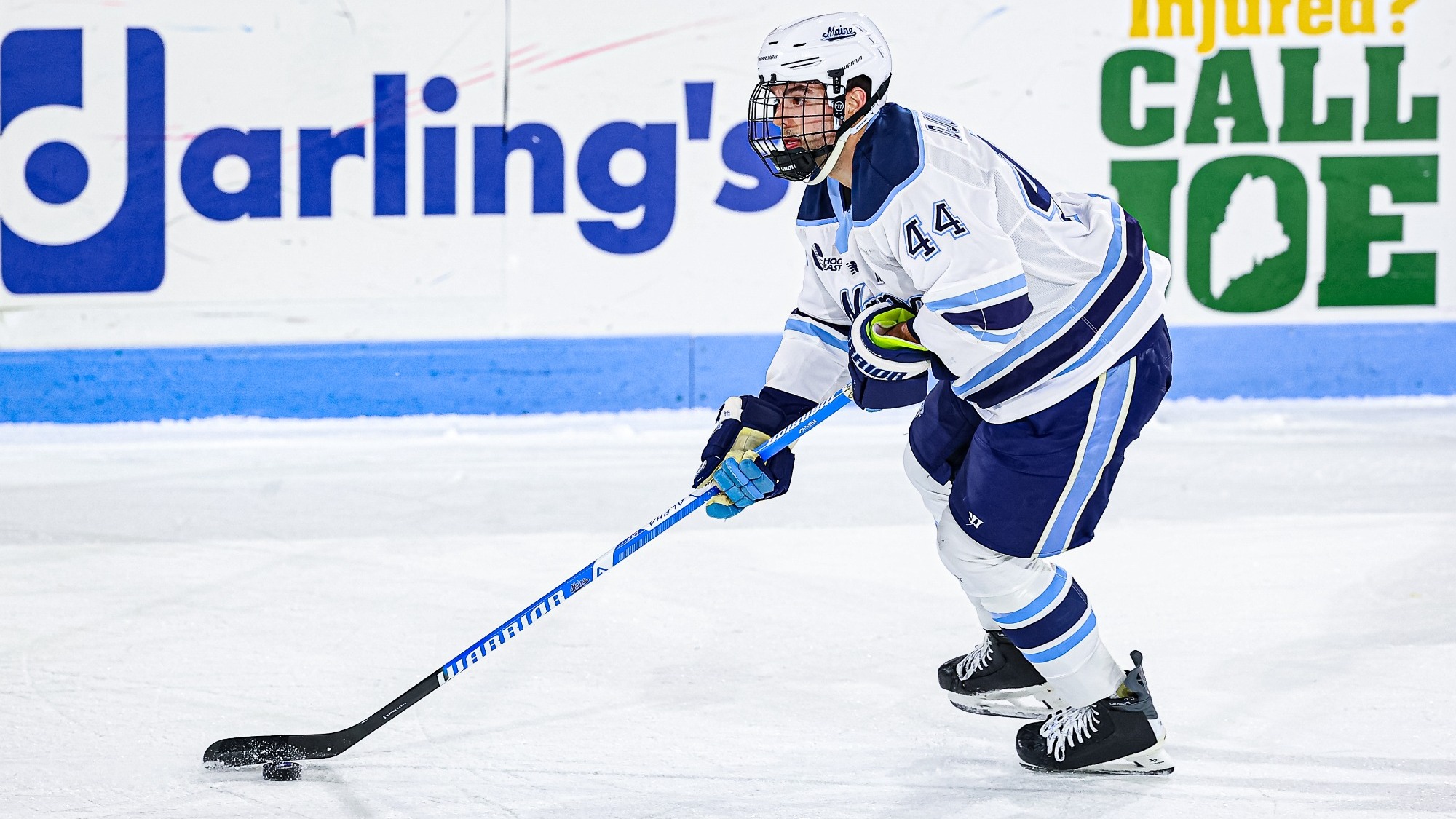 Frank Djurasevic carries the puck up the ice.