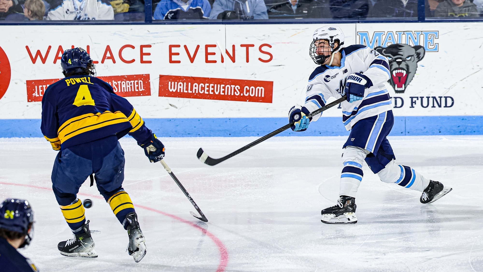 Josh Nadeau shoots the puck.
