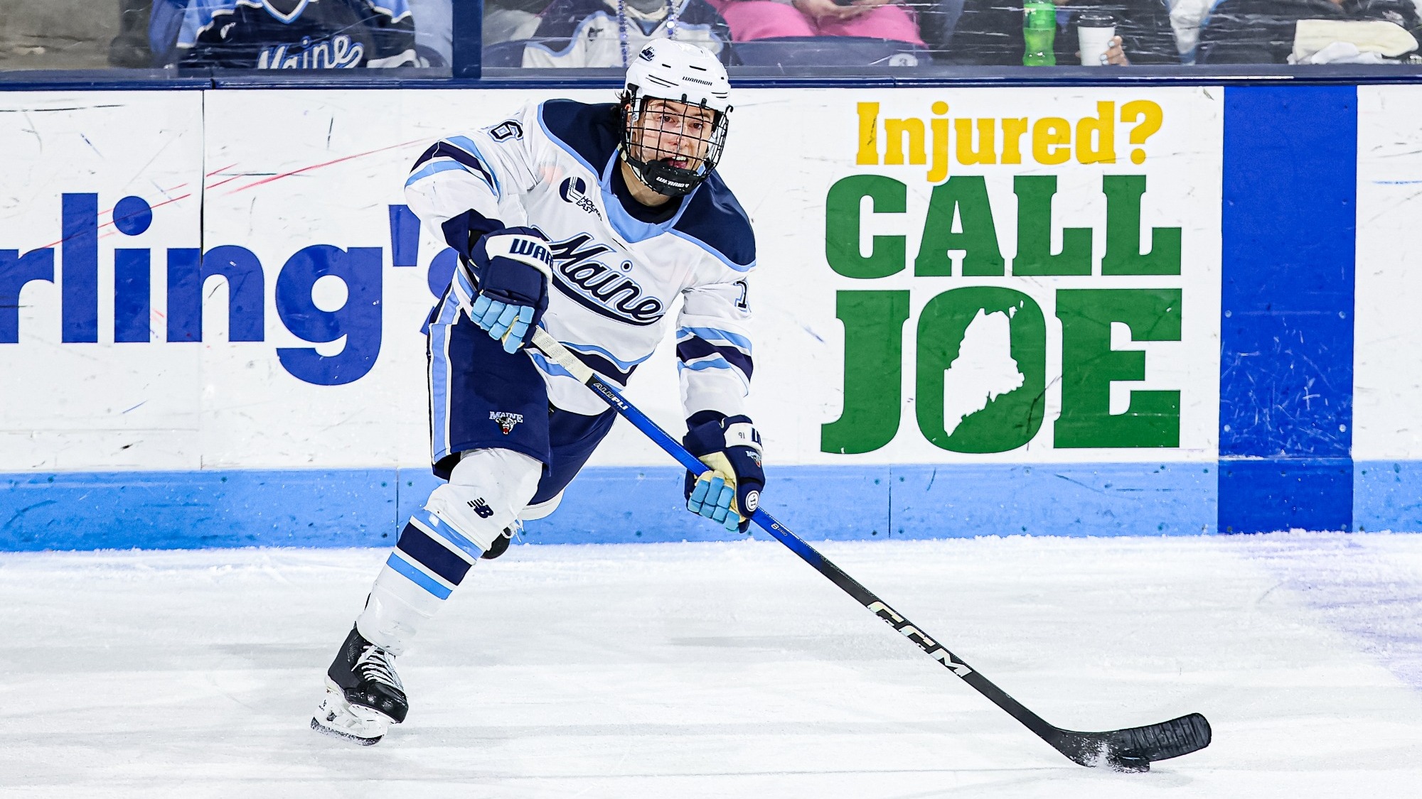 Loic Usereau carries the puck.