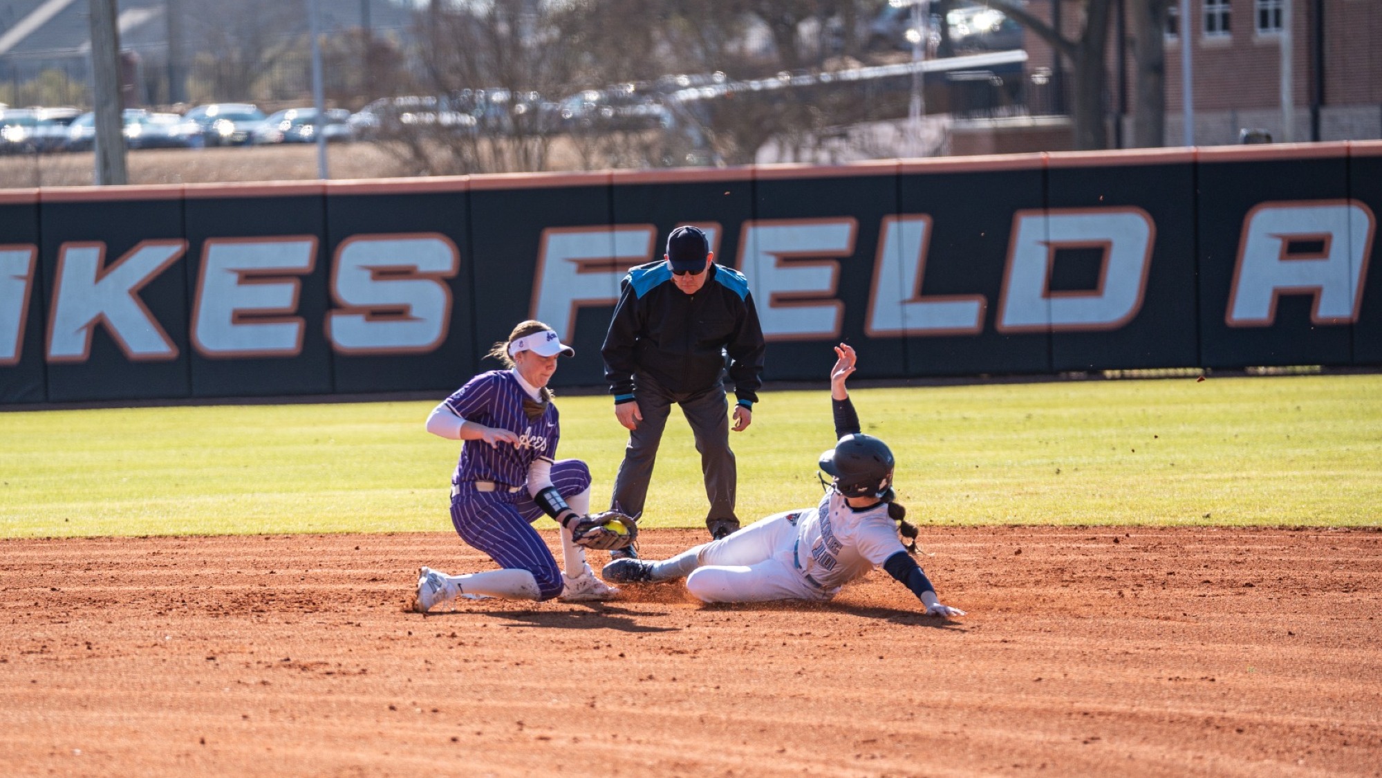 Keira INman steals a base.