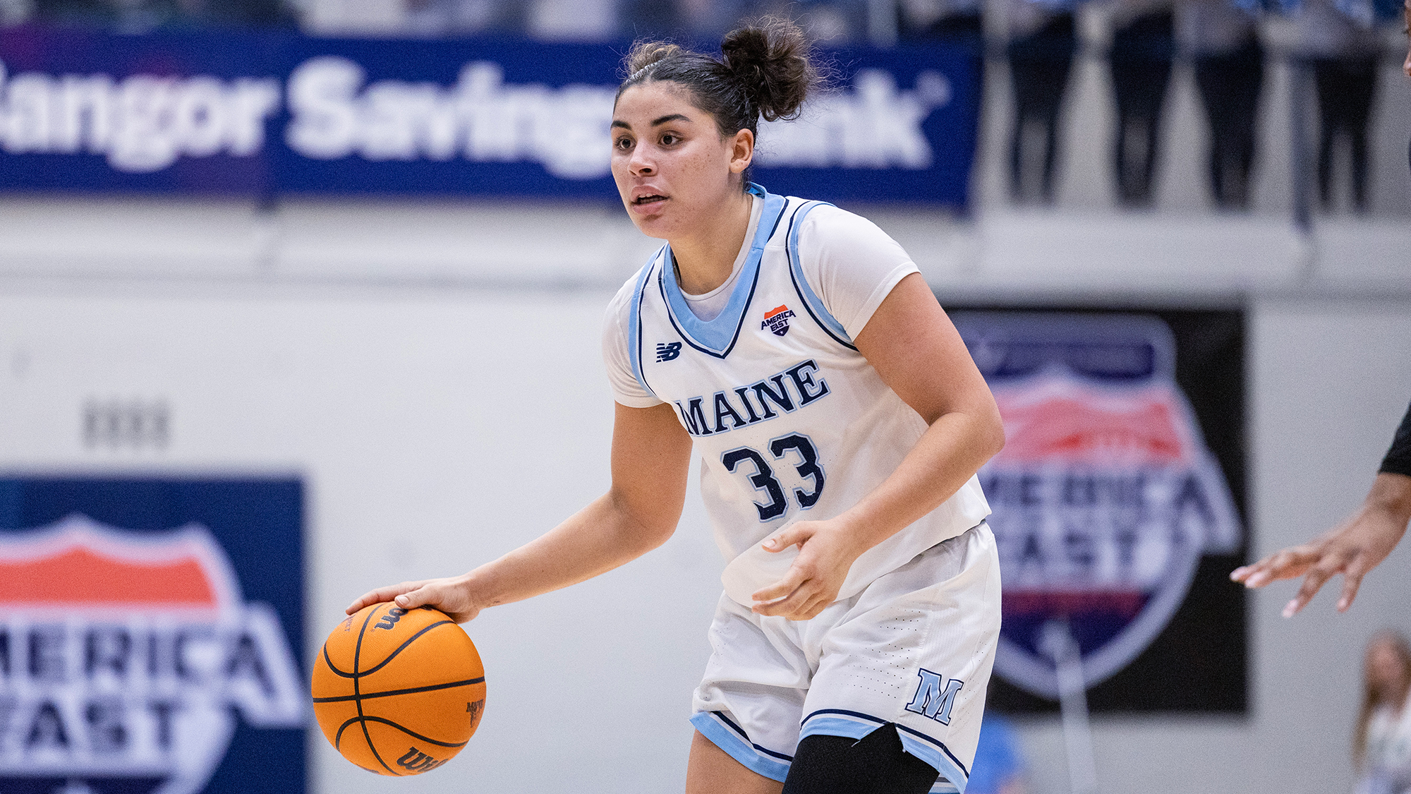 Adrianna Smith dribbles the ball in a playoff game.