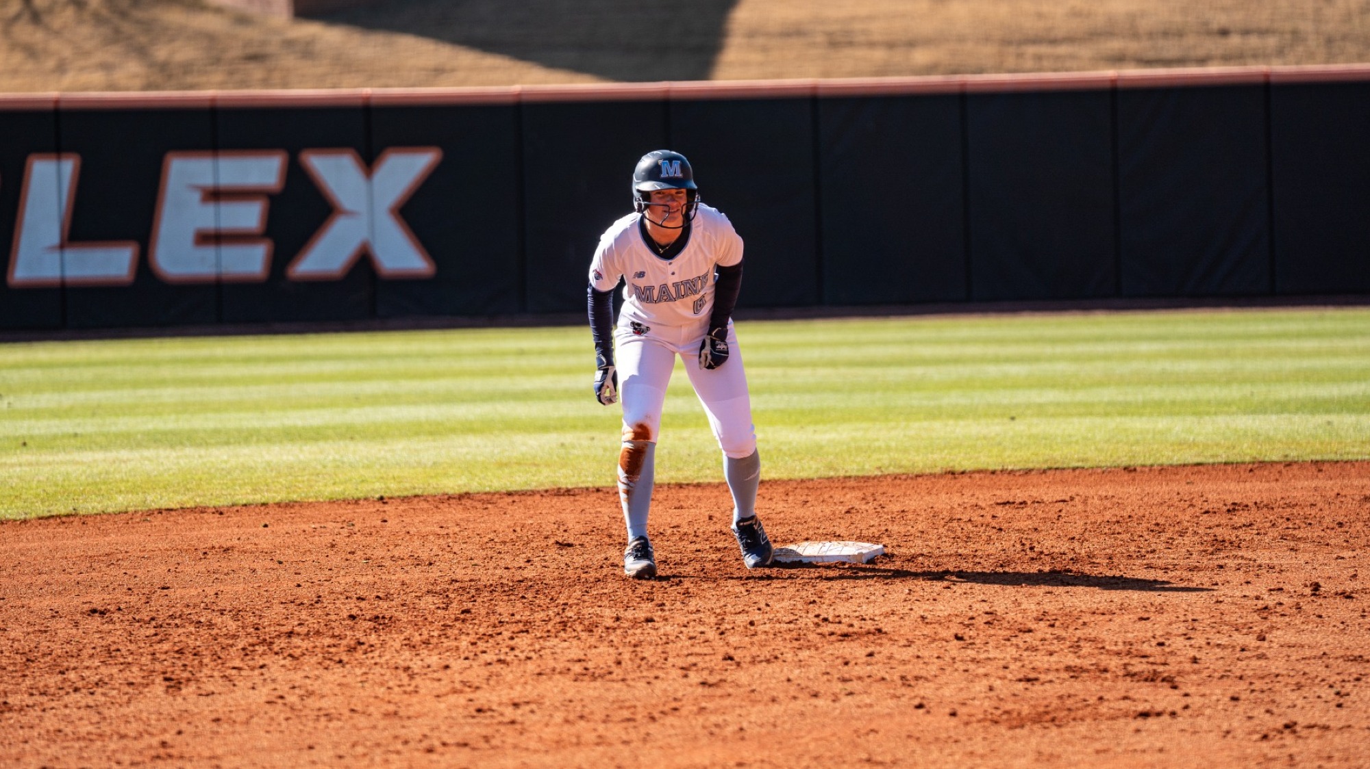 Maggie Helms stands on second base.