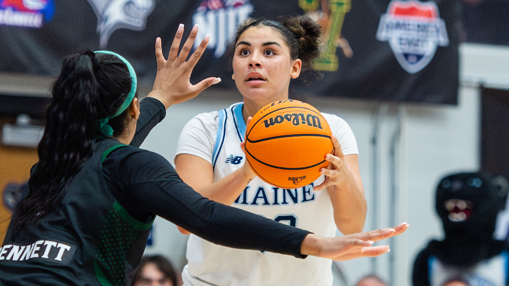 adrianna smith takes a shot over a binghamton defender