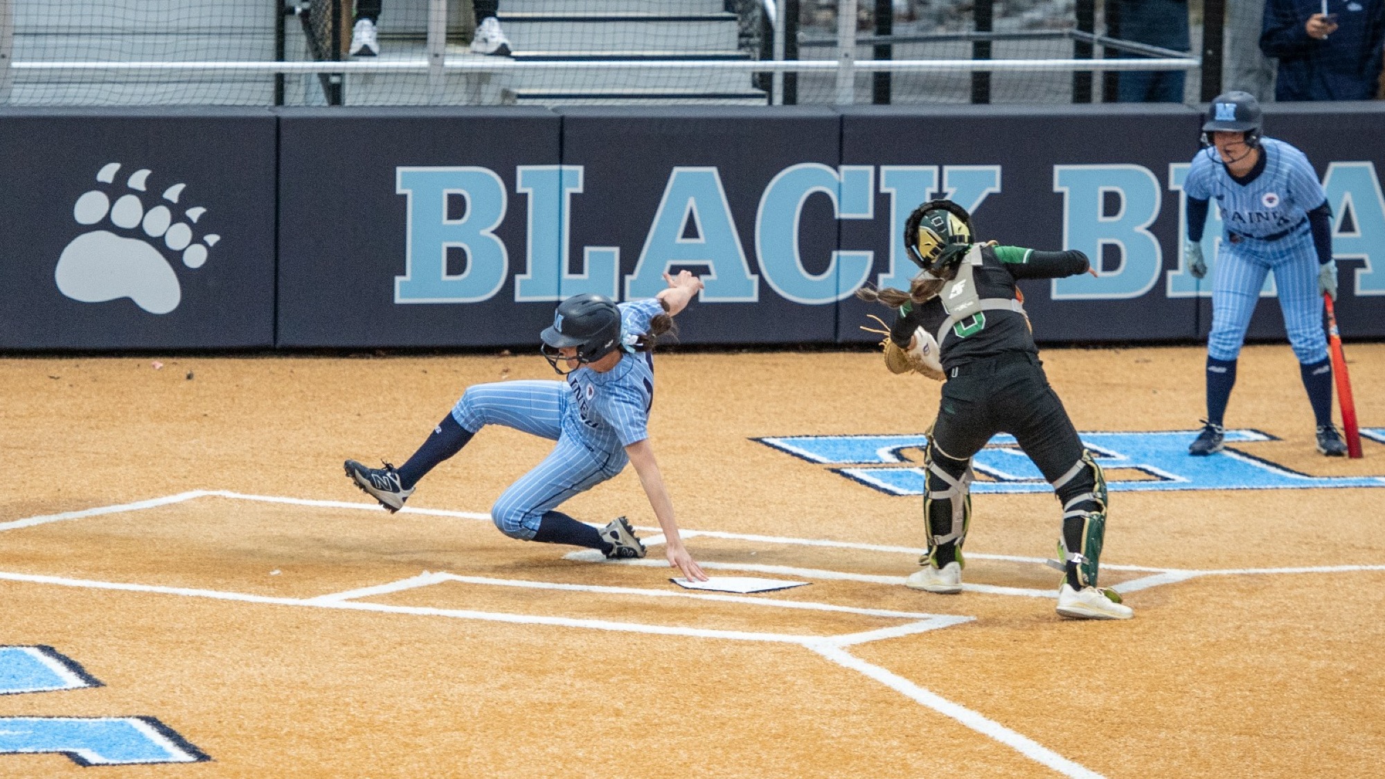 Keira Inman slides into home