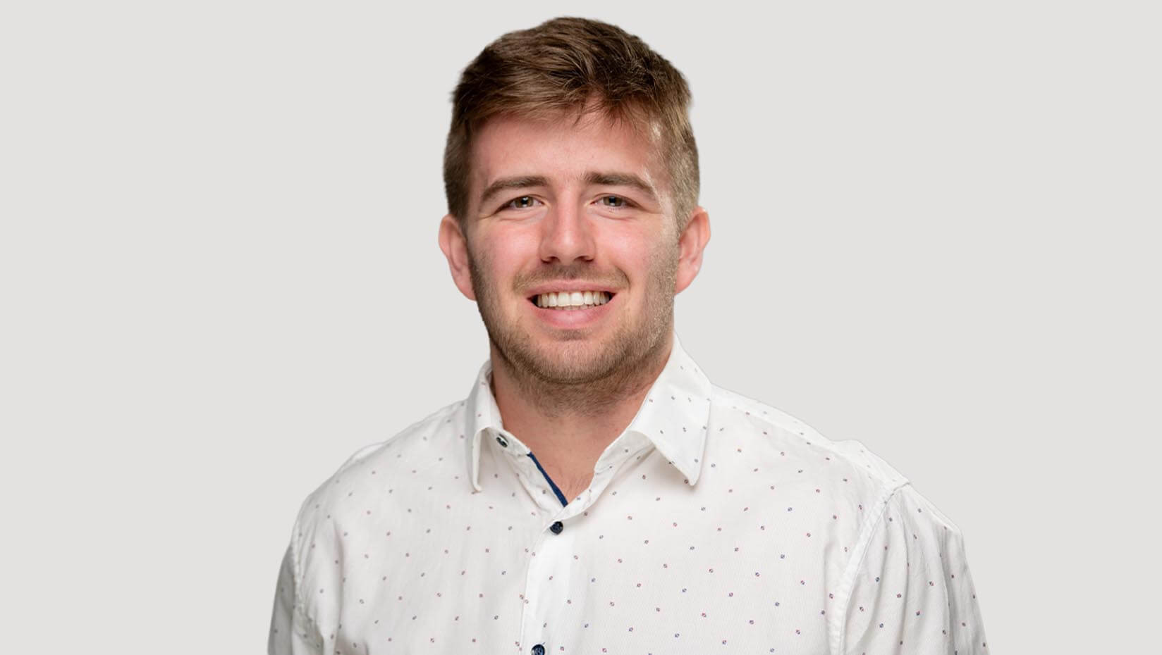 Samuel Tremblay poses for outstanding graduating student accolade