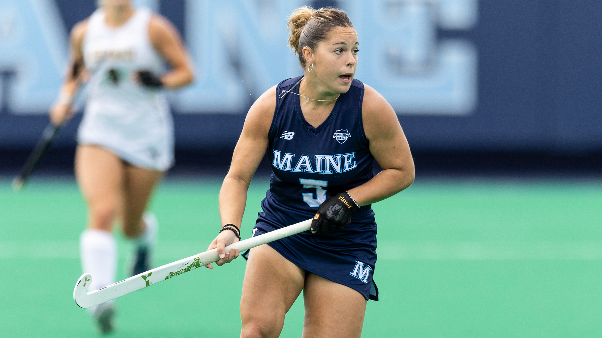 Vicky Tinghitella runs with her stick