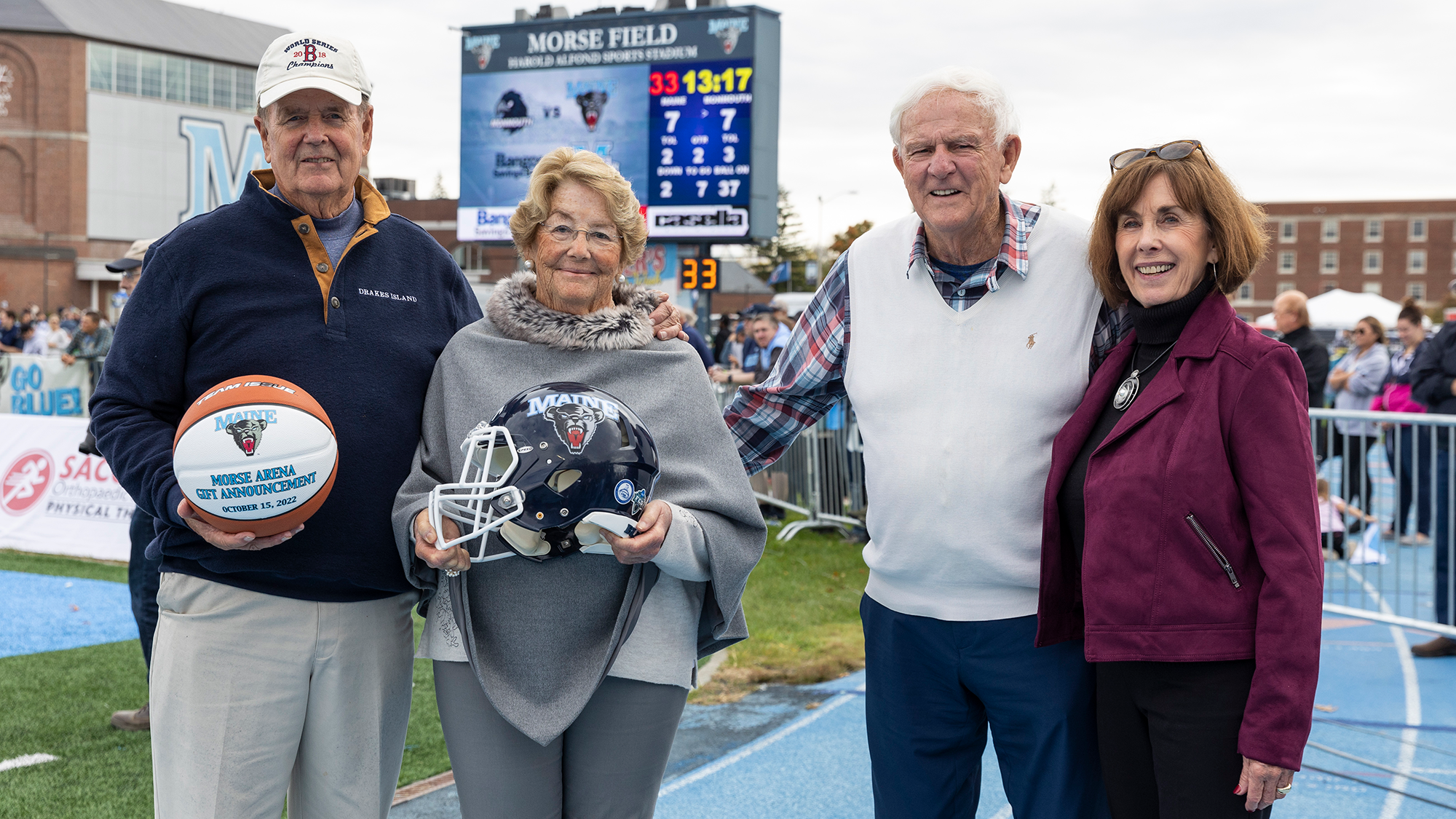 The Morse family join the Chappelles on the football sideline. 