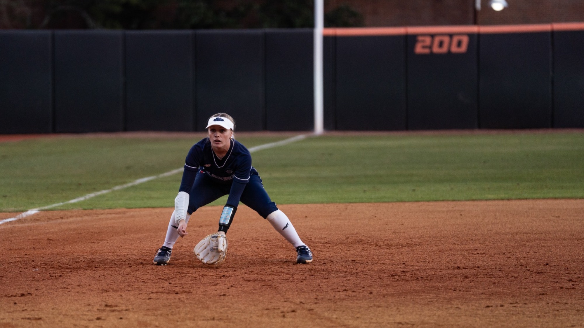 Neve Adams gets ready for a pitch at third base.