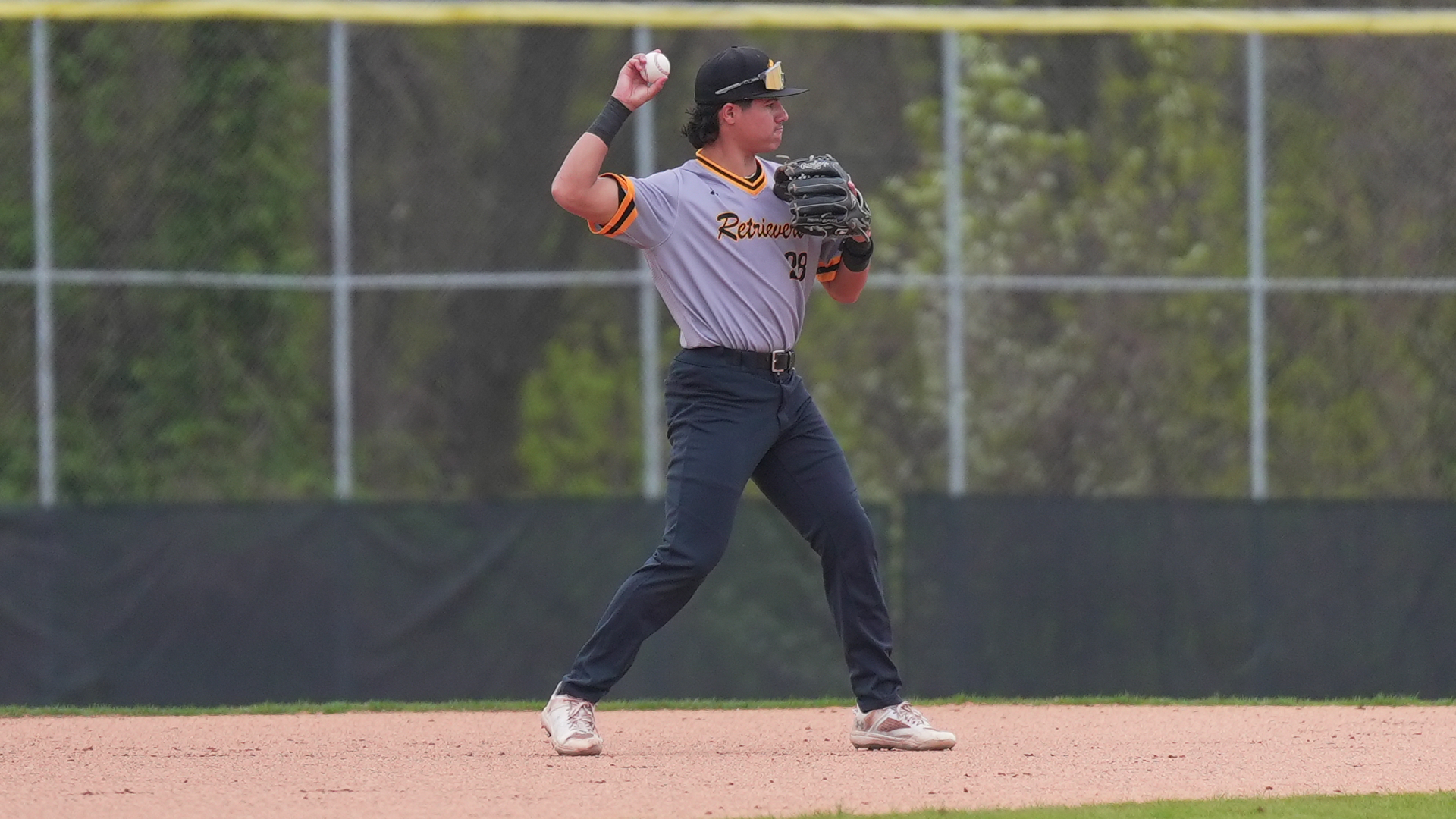 Sergio Droz throws out a runner against Binghamton