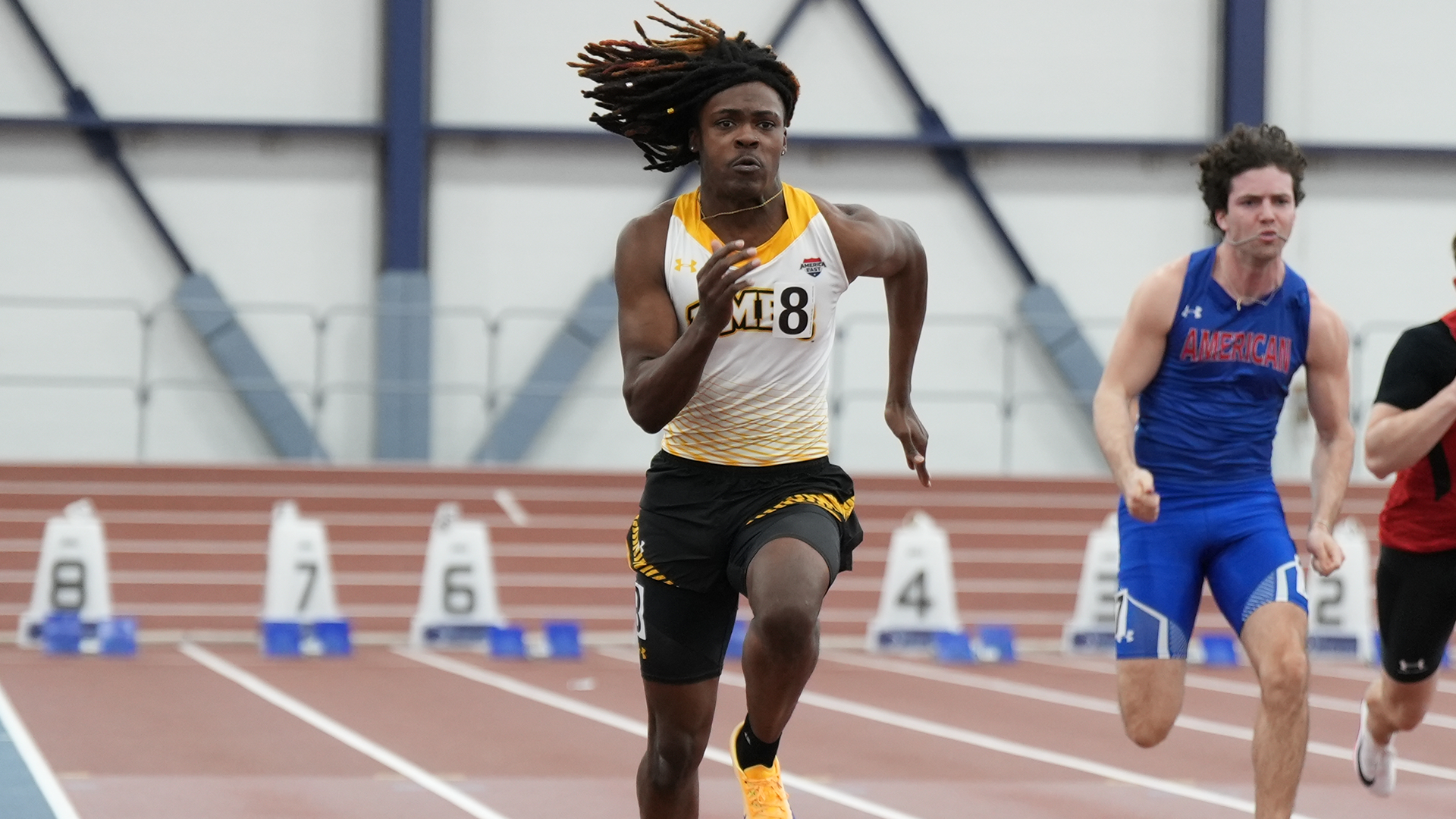 David Adisa races in the 60 at Penn State