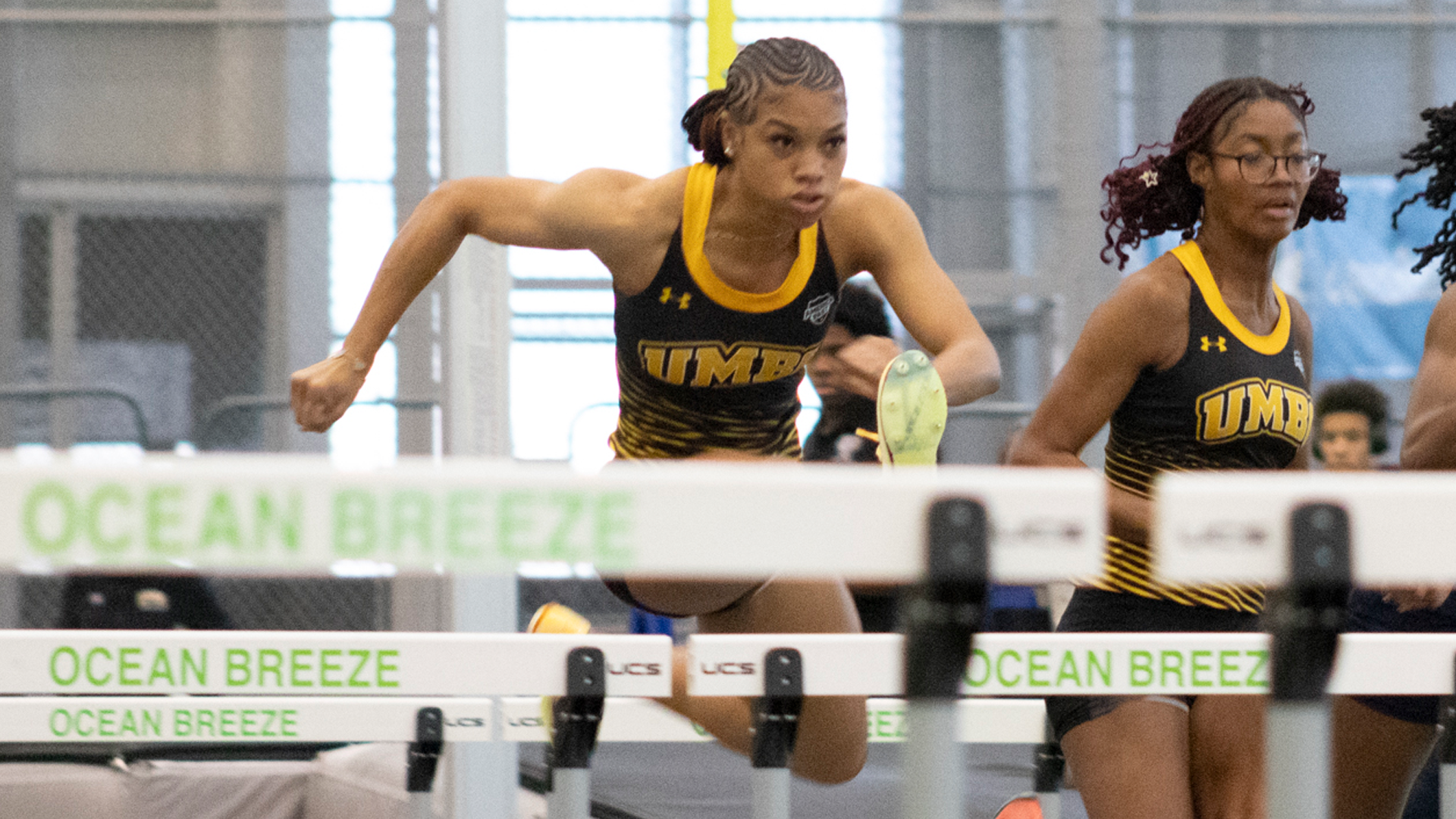 Enazajah Young runs the 60m hurdles