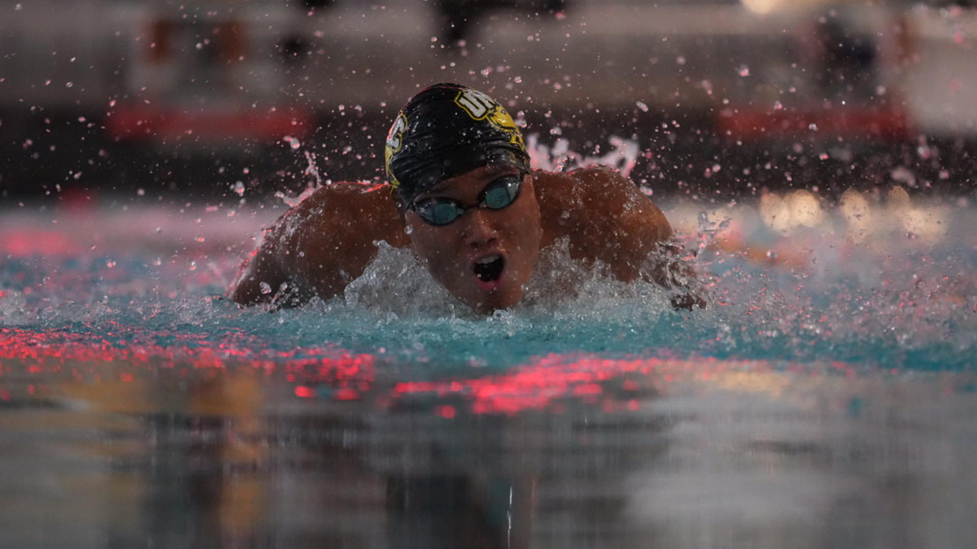 Michael Truong swims against VMI and American