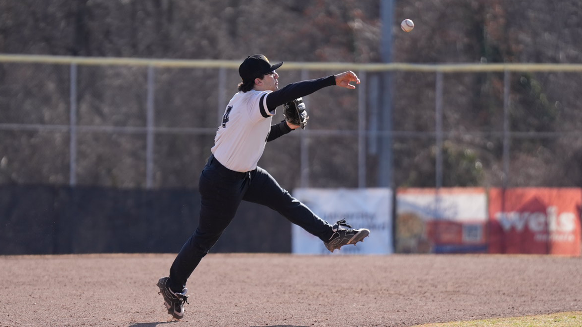 Anthony Mascuilli throws from third against Monmouth