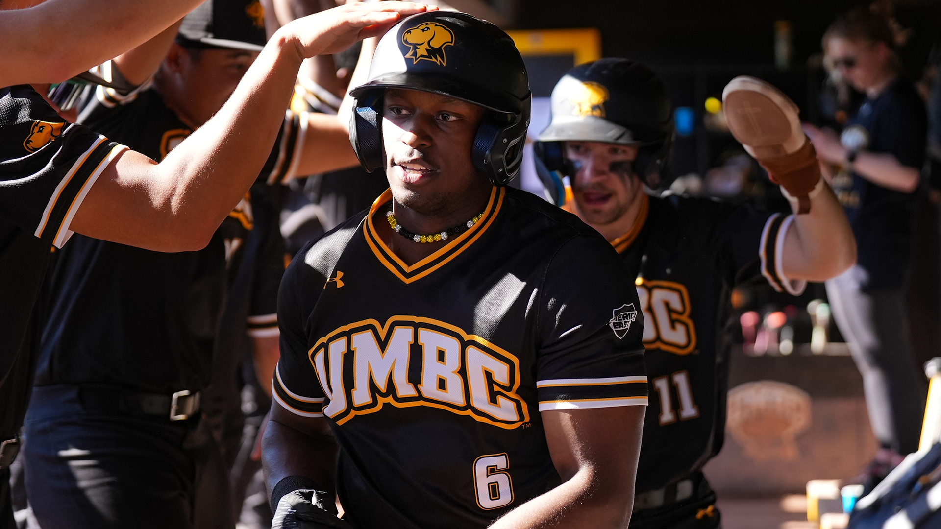 Ehi Okojie celebrates hitting a homer against Mount St. Mary's