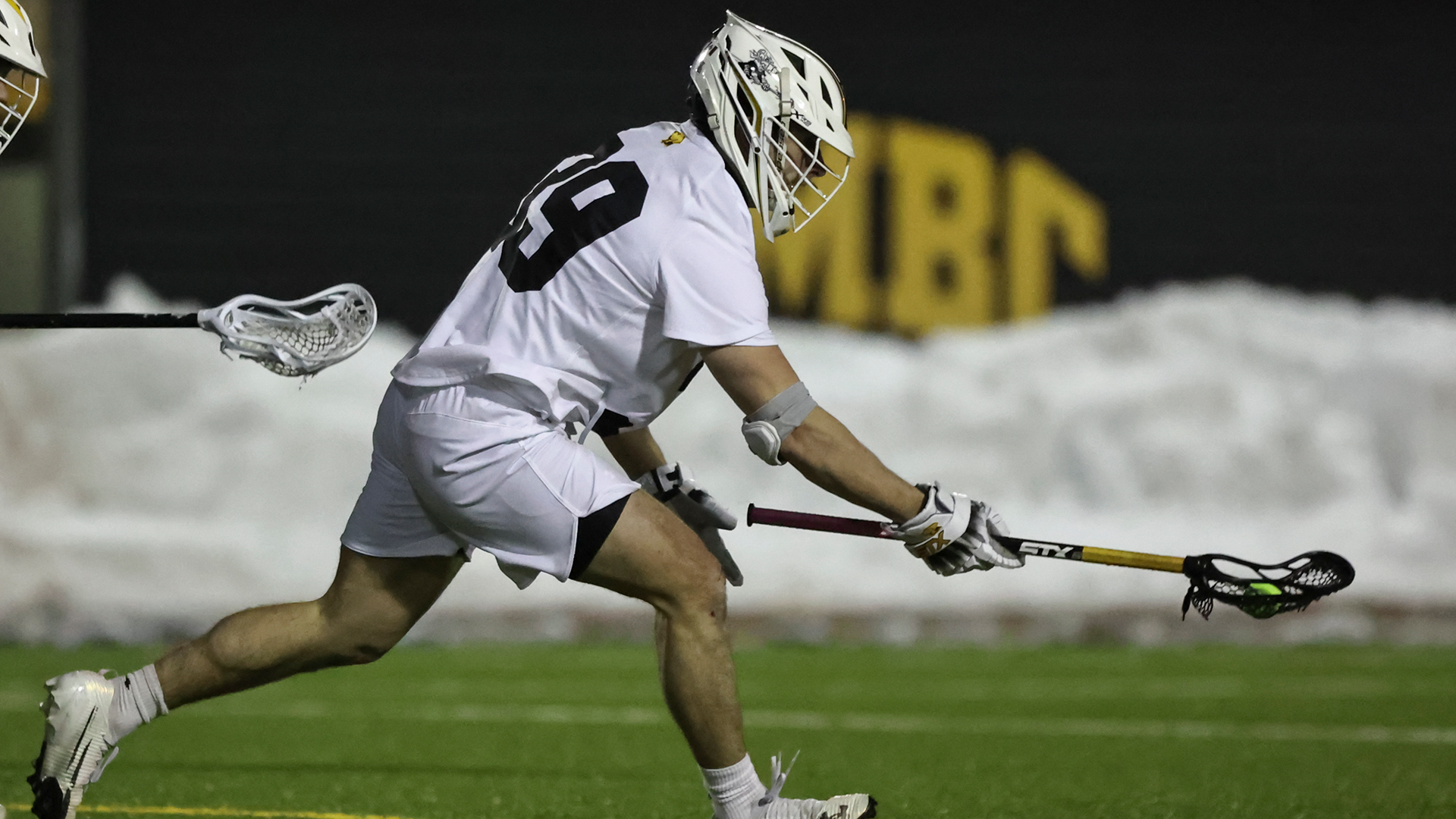 Alex Steers wins a faceoff against Drexel