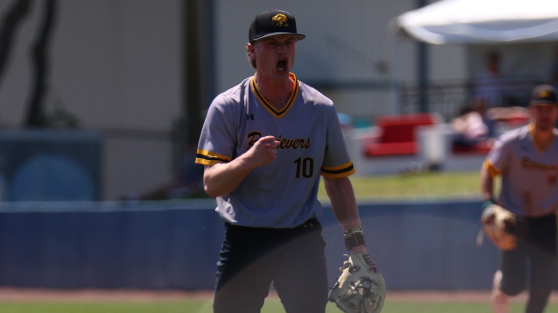 Zach Robinson yells after a strikeout at FAU