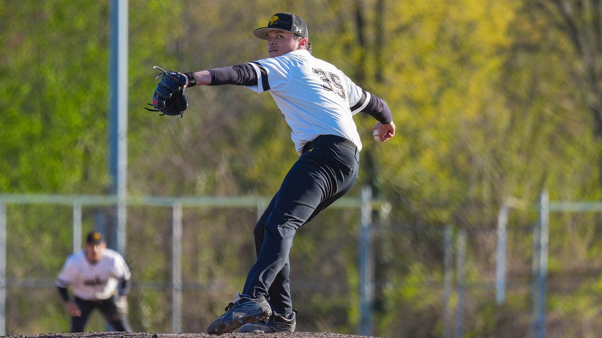 Cole Koonce winds up to throw a pitch against Maryland