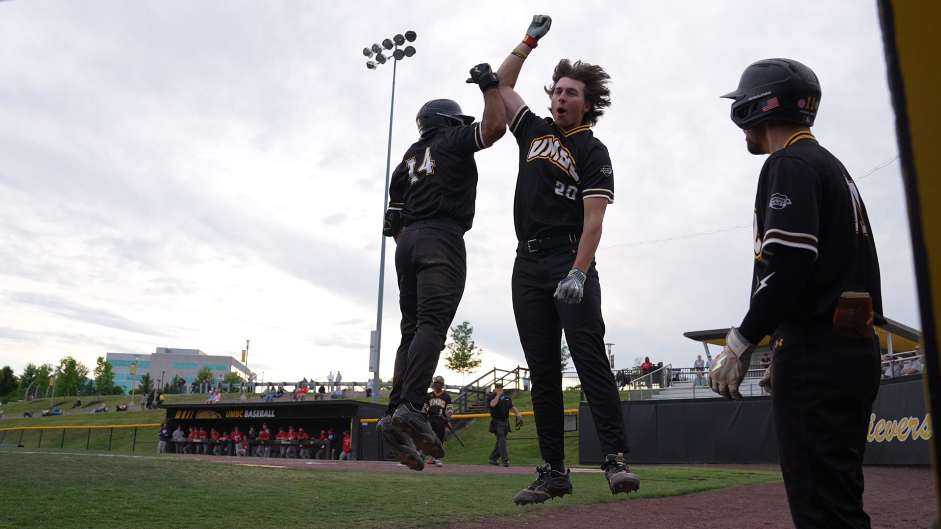 Nolan Kutney jumps to celebrate a home run against NJIT