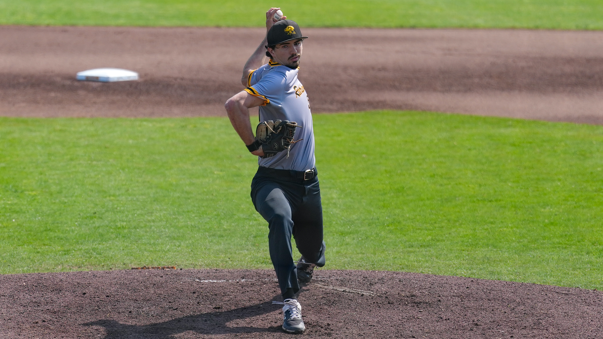 Brady LeJeune-DeAcutis pitches a ball 