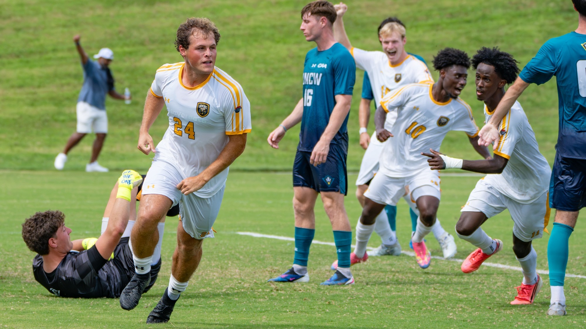 Logan Ehart scores in the UMBC opener