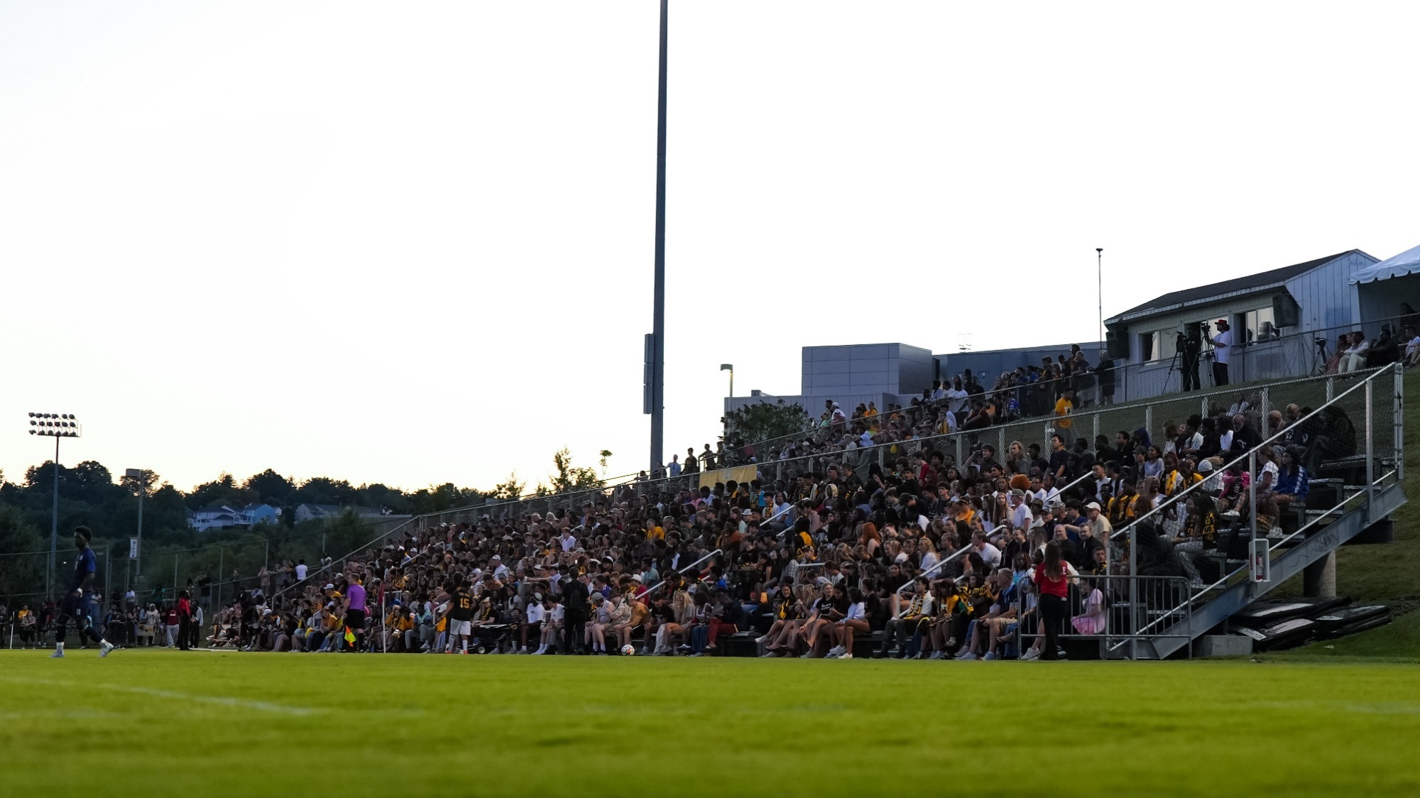 Fans watch a game at Retriever Soccer Park