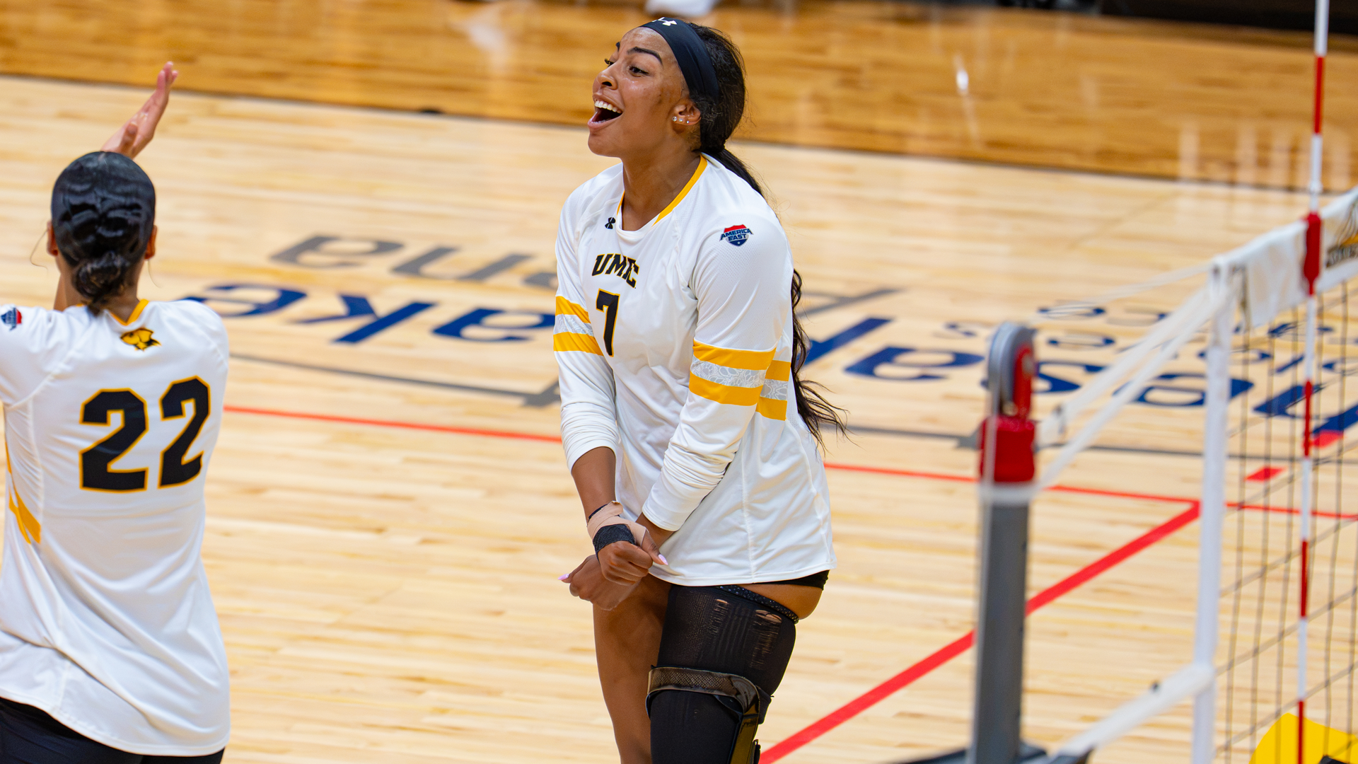 Natalie Harris celebrates a point against Georgetown